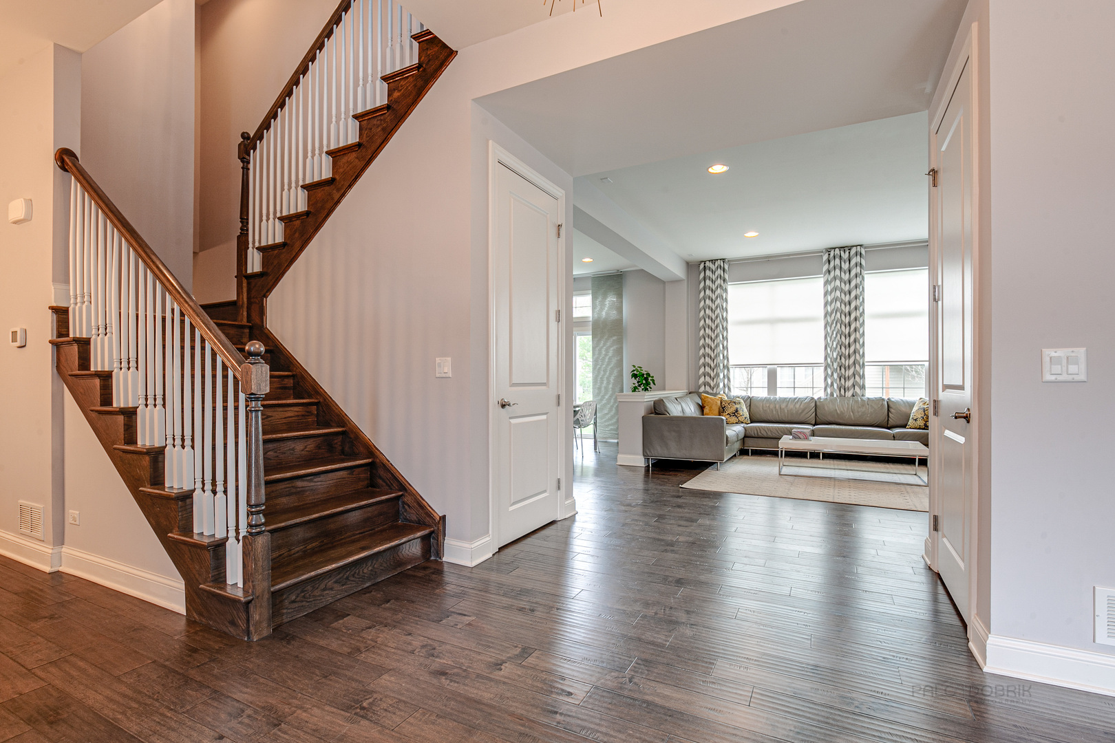 1120 Ashley Lane Inverness, IL 60010 - Photo 19 of 46 a view of a living room and wooden floor windows