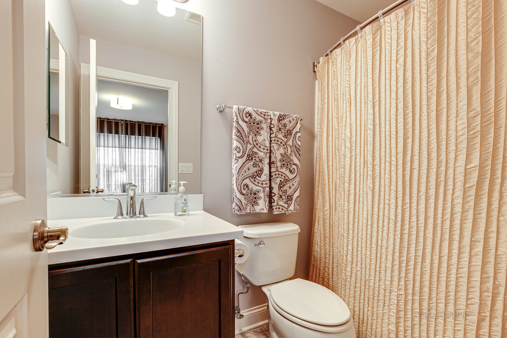 1120 Ashley Lane Inverness, IL 60010 - Photo 26 of 46 a bathroom with a sink a toilet and shower
