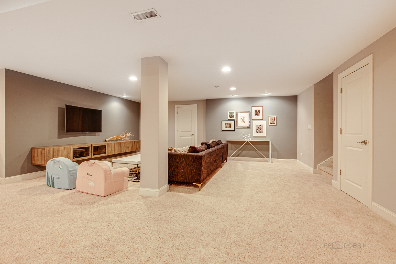 1120 Ashley Lane Inverness, IL 60010 - Photo 33 of 46 a living room with furniture and a flat screen tv