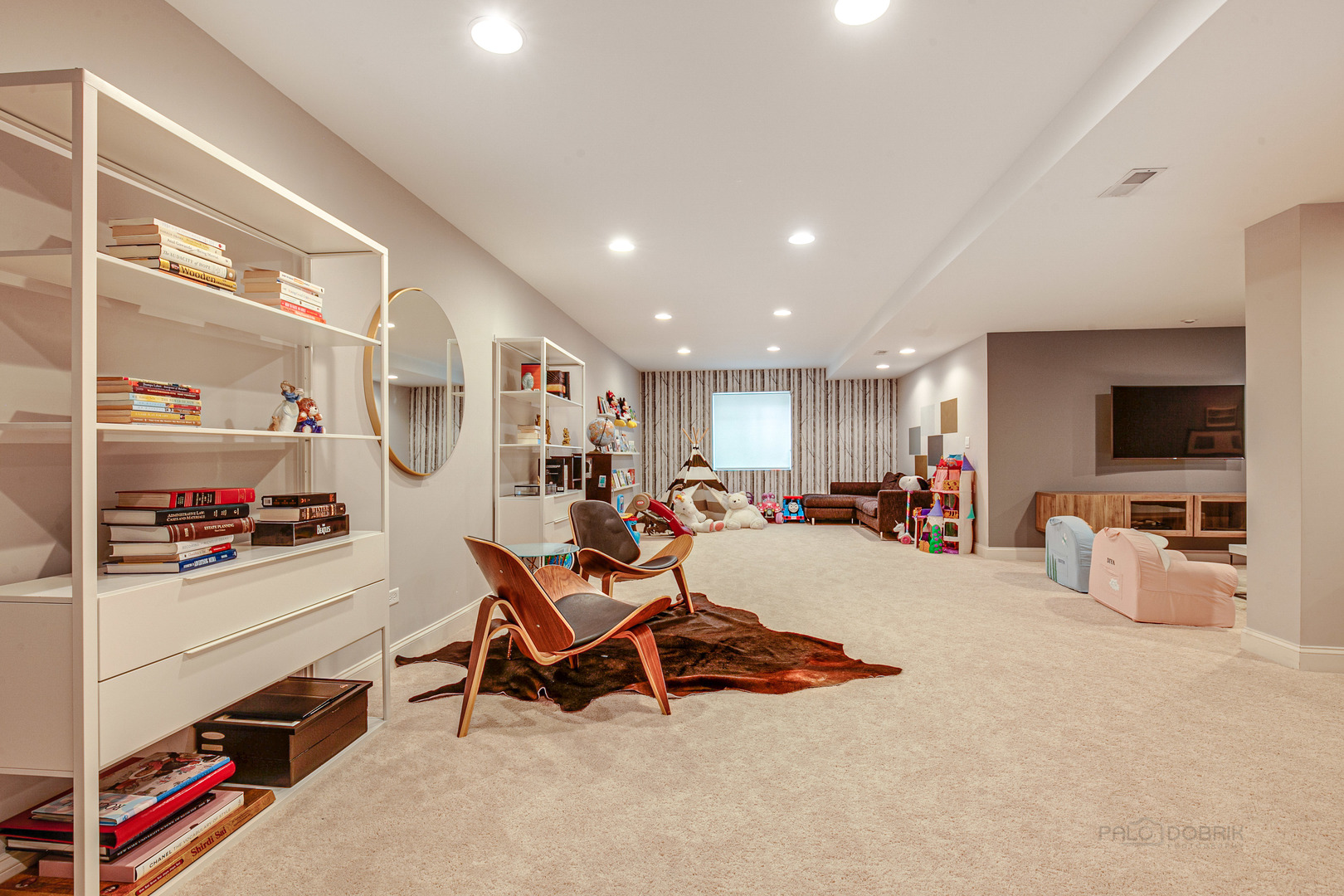 1120 Ashley Lane Inverness, IL 60010 - Photo 34 of 46 a room with furniture and a flat screen tv