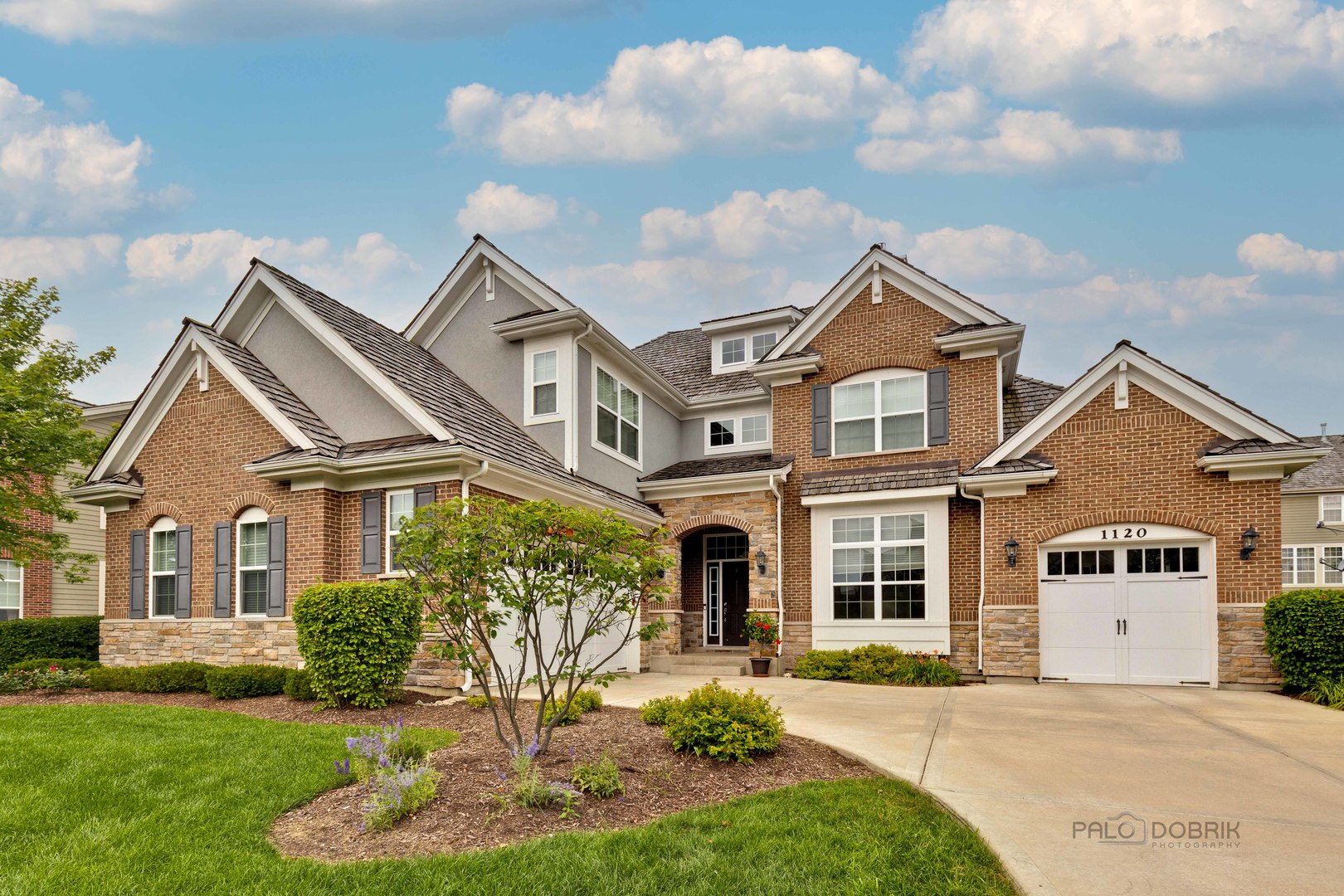 1120 Ashley Lane Inverness, IL 60010 - Photo 41 of 46 front view of a house with a yard