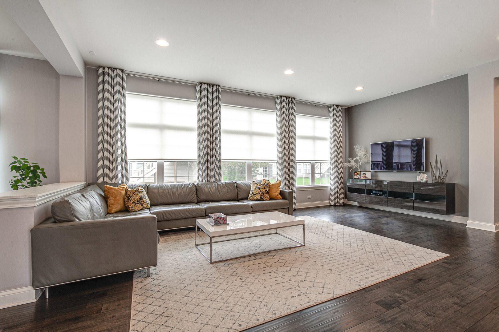 1120 Ashley Lane Inverness, IL 60010 - Photo 7 of 46 a living room with furniture and a flat screen tv