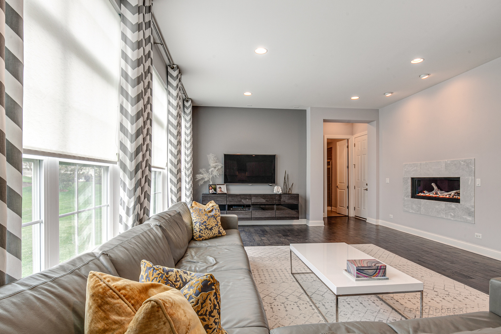 1120 Ashley Lane Inverness, IL 60010 - Photo 8 of 46 a living room with furniture and a flat screen tv