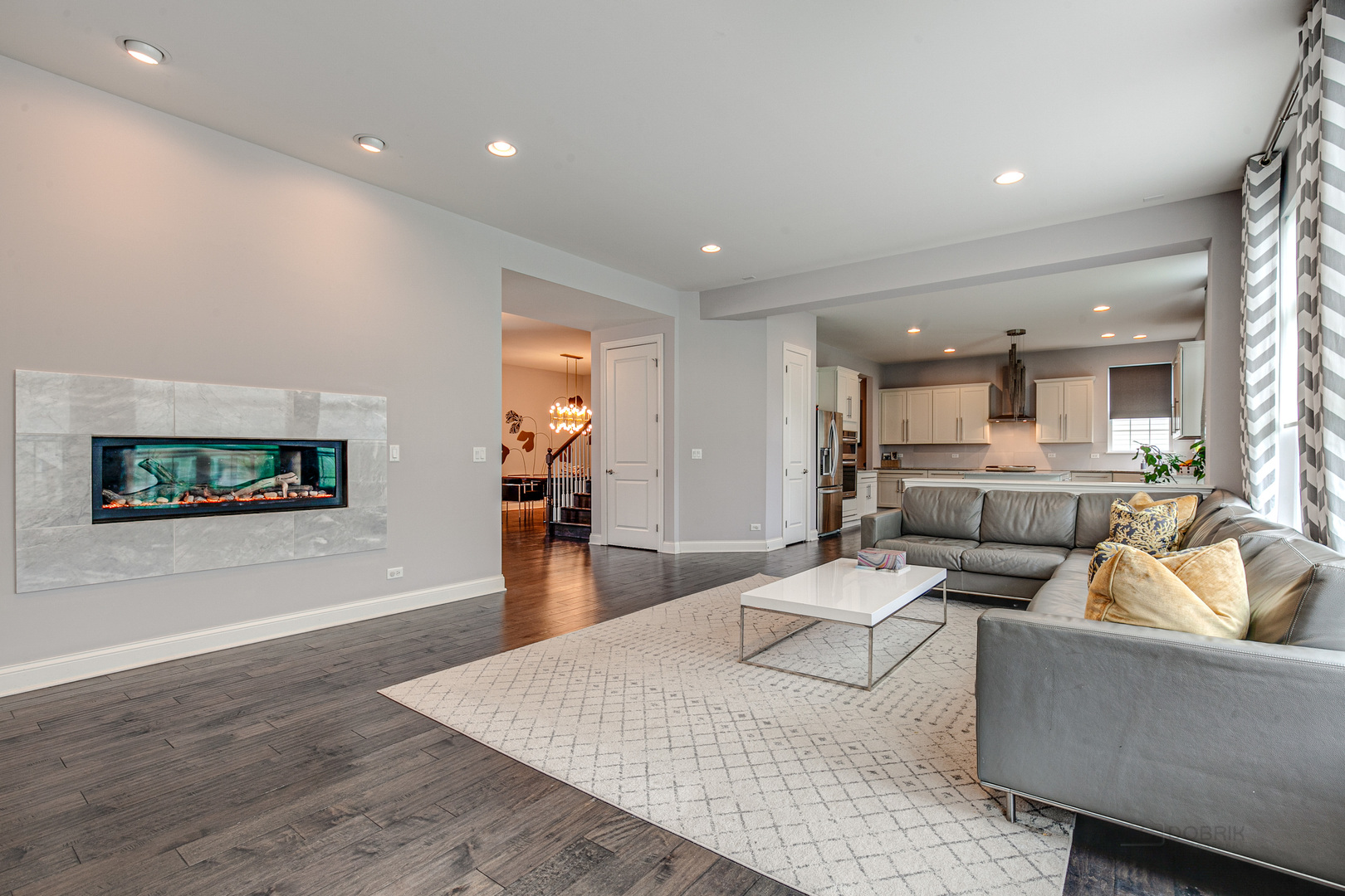 1120 Ashley Lane Inverness, IL 60010 - Photo 10 of 46 a living room with furniture and a flat screen tv