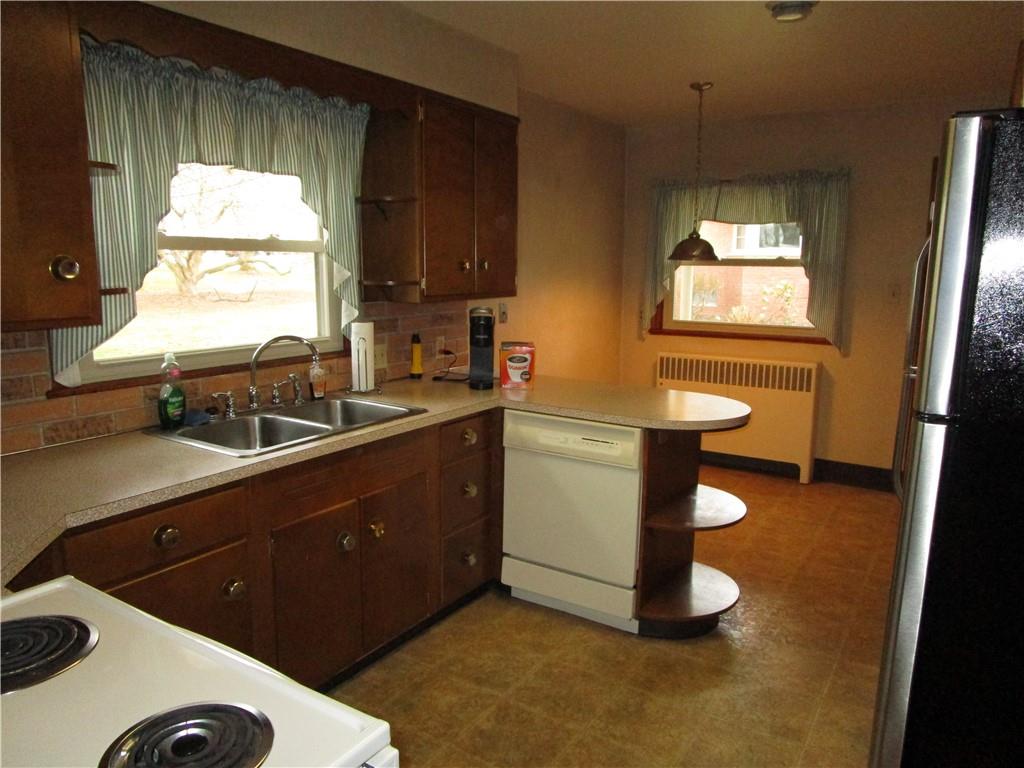 410 Hazen Road Sharpsville, PA 16150 - Photo 11 of 22 a kitchen with a sink and a window