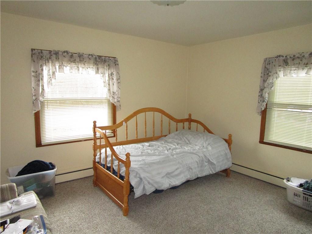 410 Hazen Road Sharpsville, PA 16150 - Photo 15 of 22 a bedroom with a bed and window