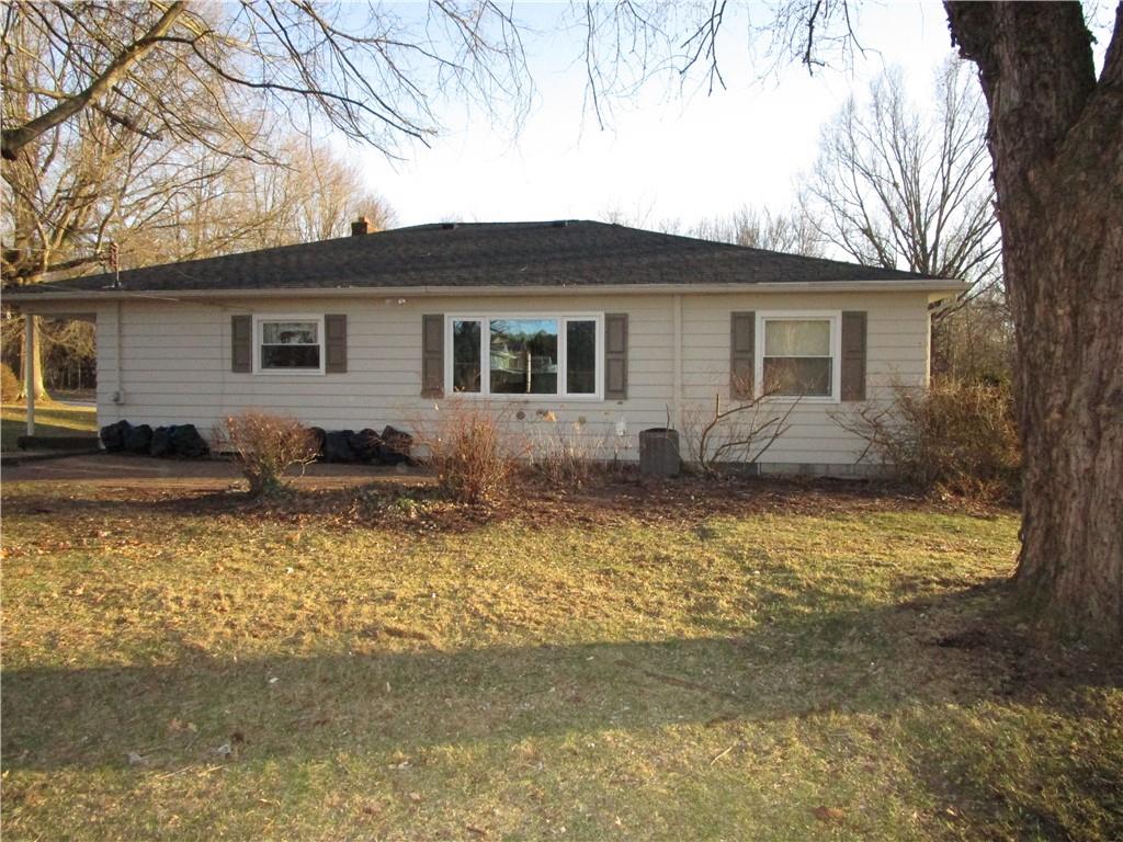 410 Hazen Road Sharpsville, PA 16150 - Photo 2 of 22 a view of a house with a yard covered with snow in front of it