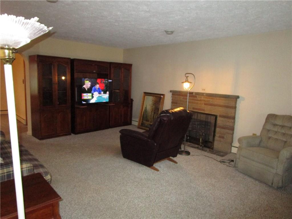 410 Hazen Road Sharpsville, PA 16150 - Photo 5 of 22 a living room with furniture and a flat screen tv