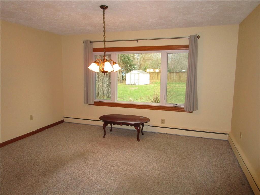 410 Hazen Road Sharpsville, PA 16150 - Photo 9 of 22 a living room with furniture and a window