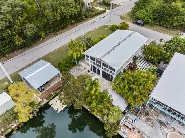 an aerial view of a house with a garden