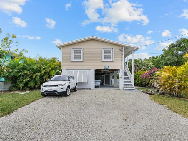 a view of a table and chairs in patio