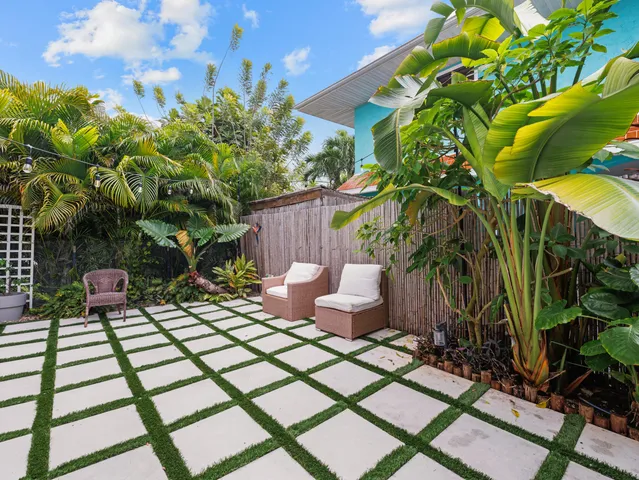 a backyard of a house with lots of green space