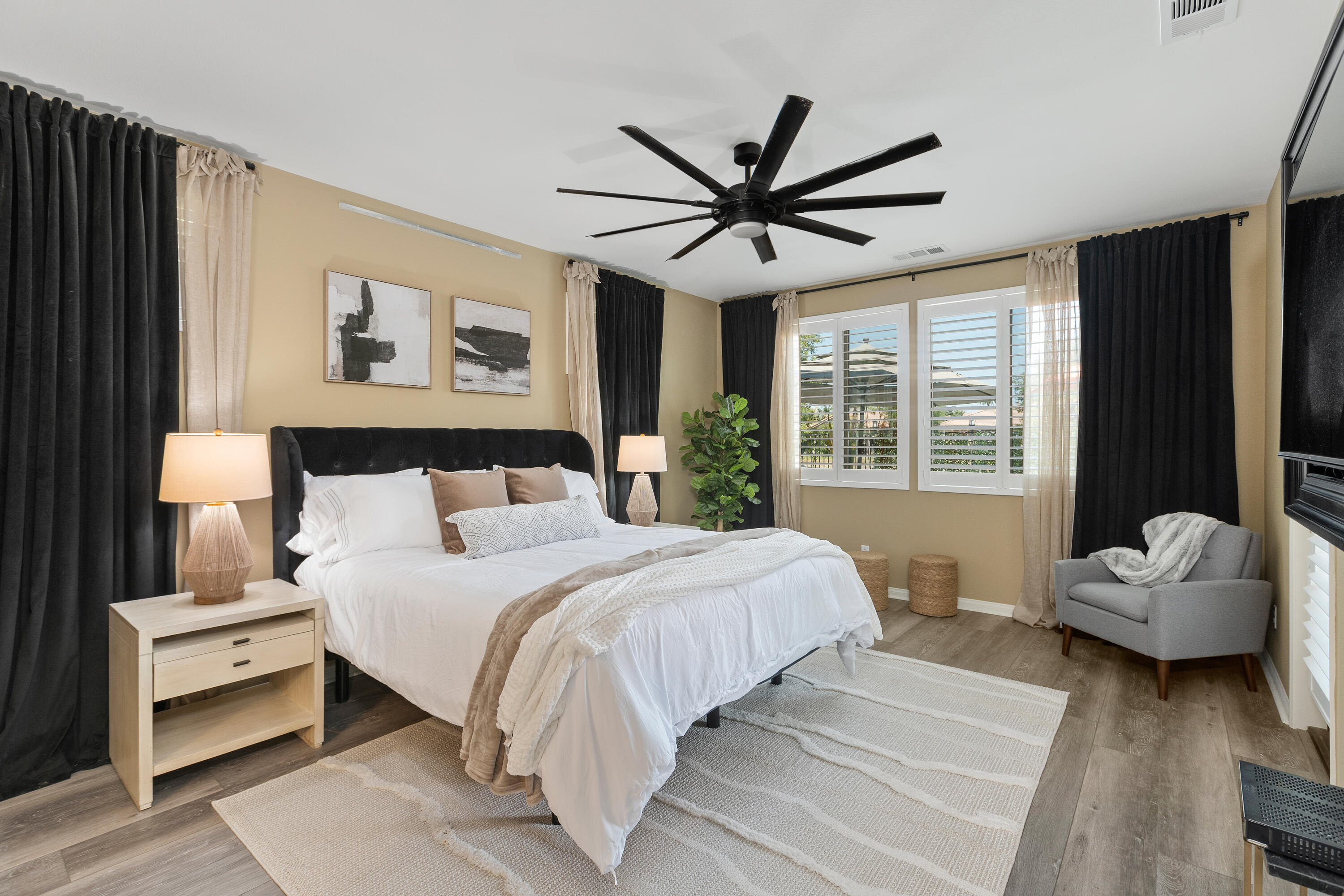 82700 Burnette Drive Indio, CA 92201 - Photo 12 of 38 a bedroom with a bed and a window