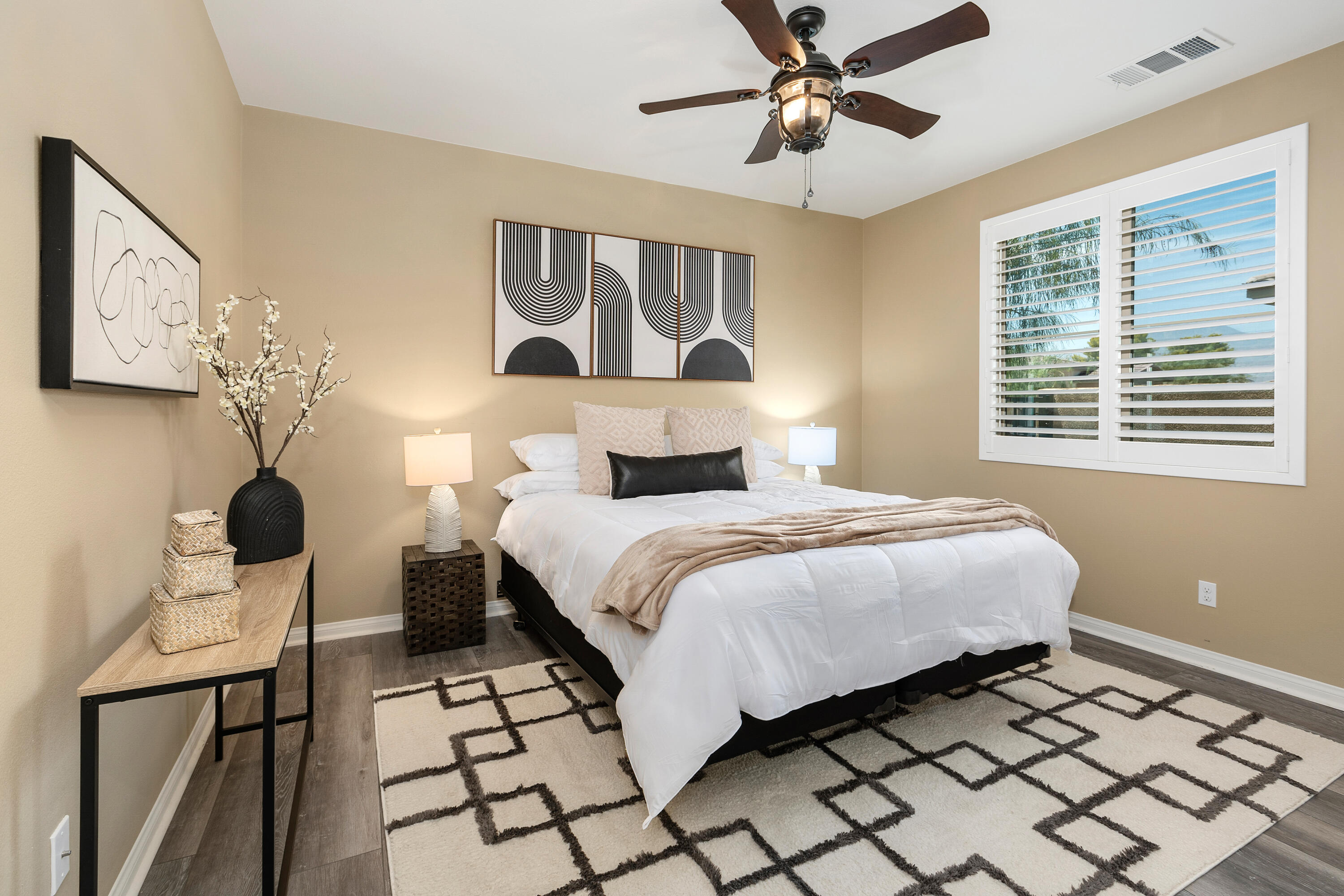 82700 Burnette Drive Indio, CA 92201 - Photo 19 of 38 a bedroom with a bed and a window