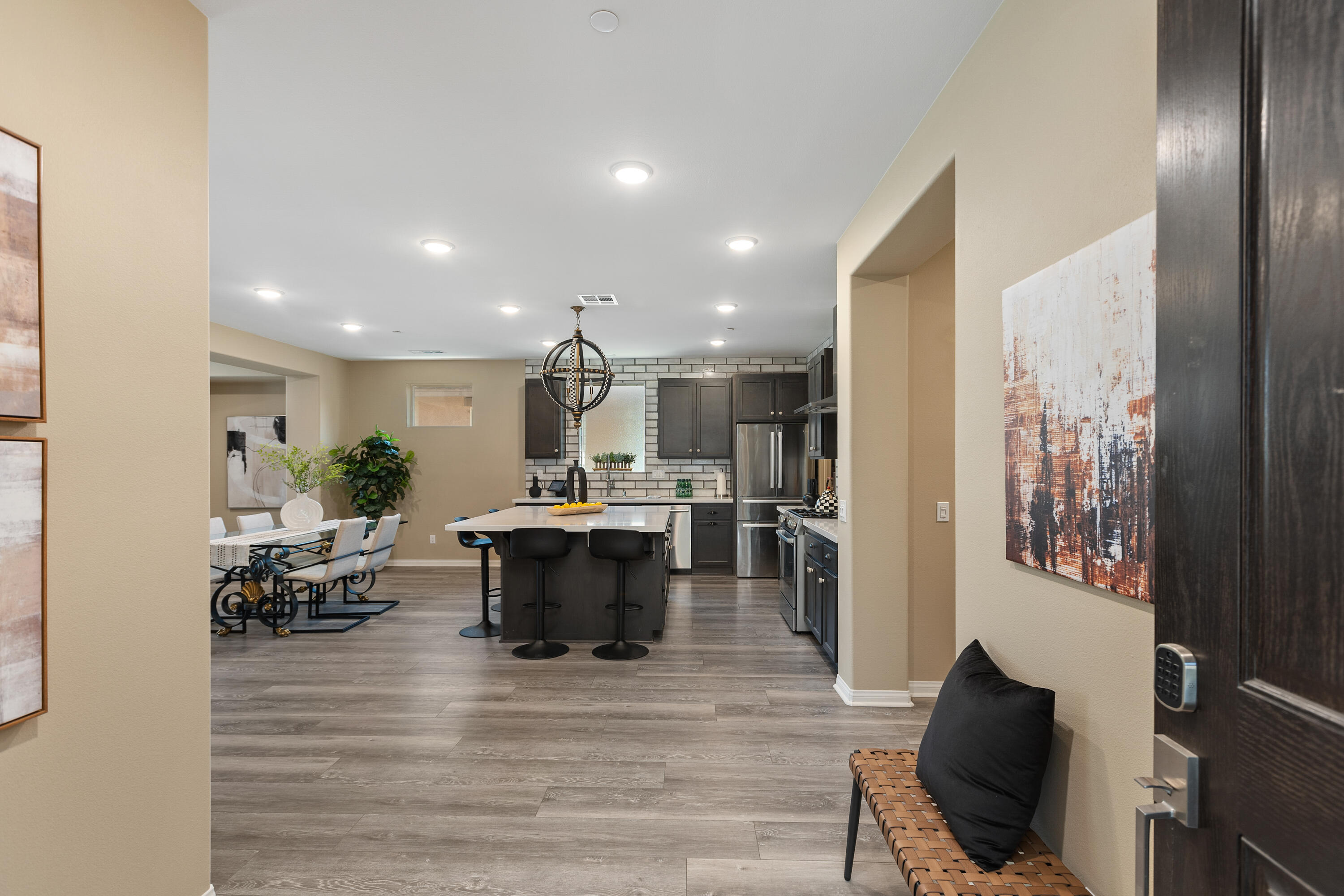 82700 Burnette Drive Indio, CA 92201 - Photo 2 of 38 a view of a dining room with furniture window and wooden floor