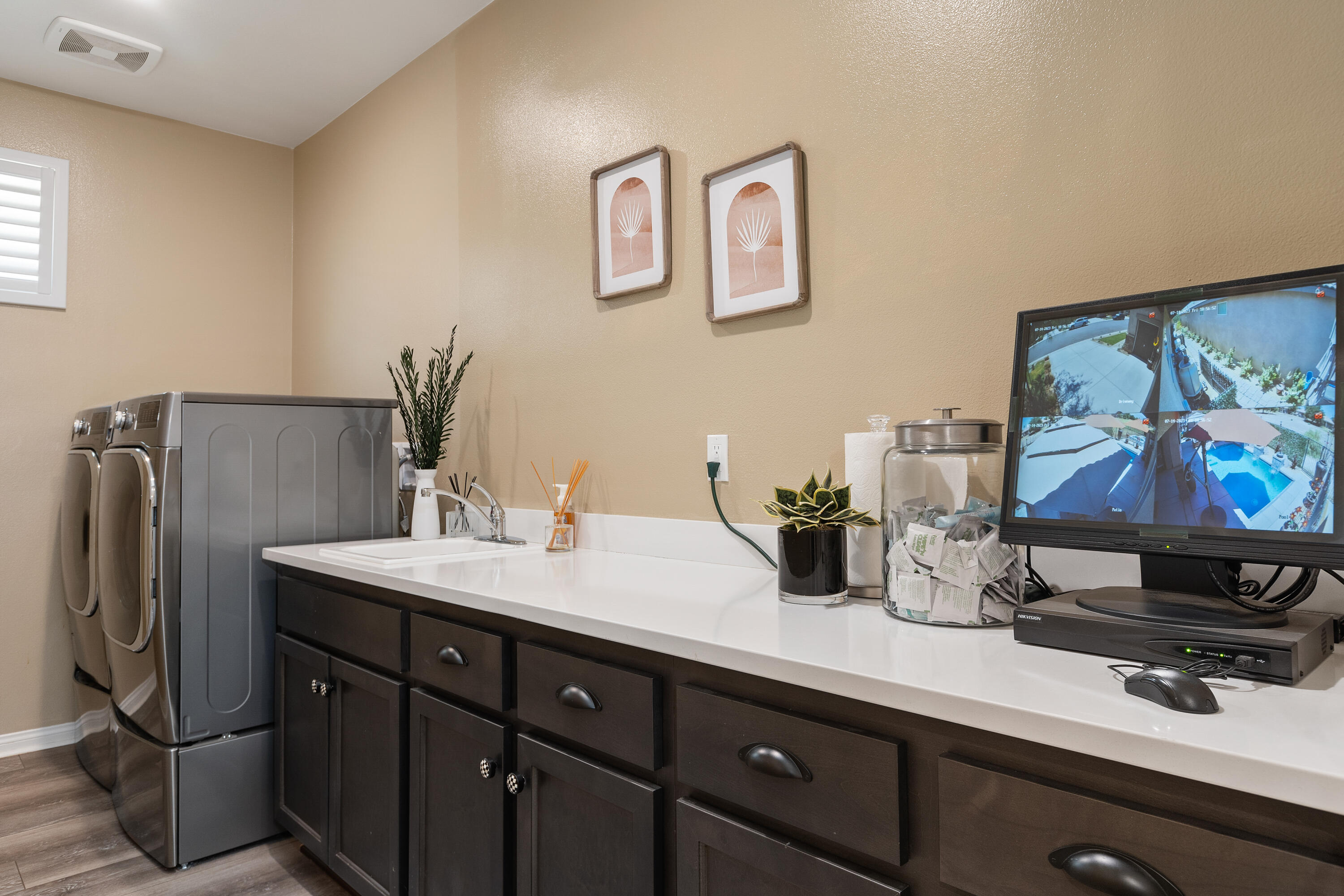 82700 Burnette Drive Indio, CA 92201 - Photo 22 of 38 a kitchen with stainless steel appliances a sink and a refrigerator