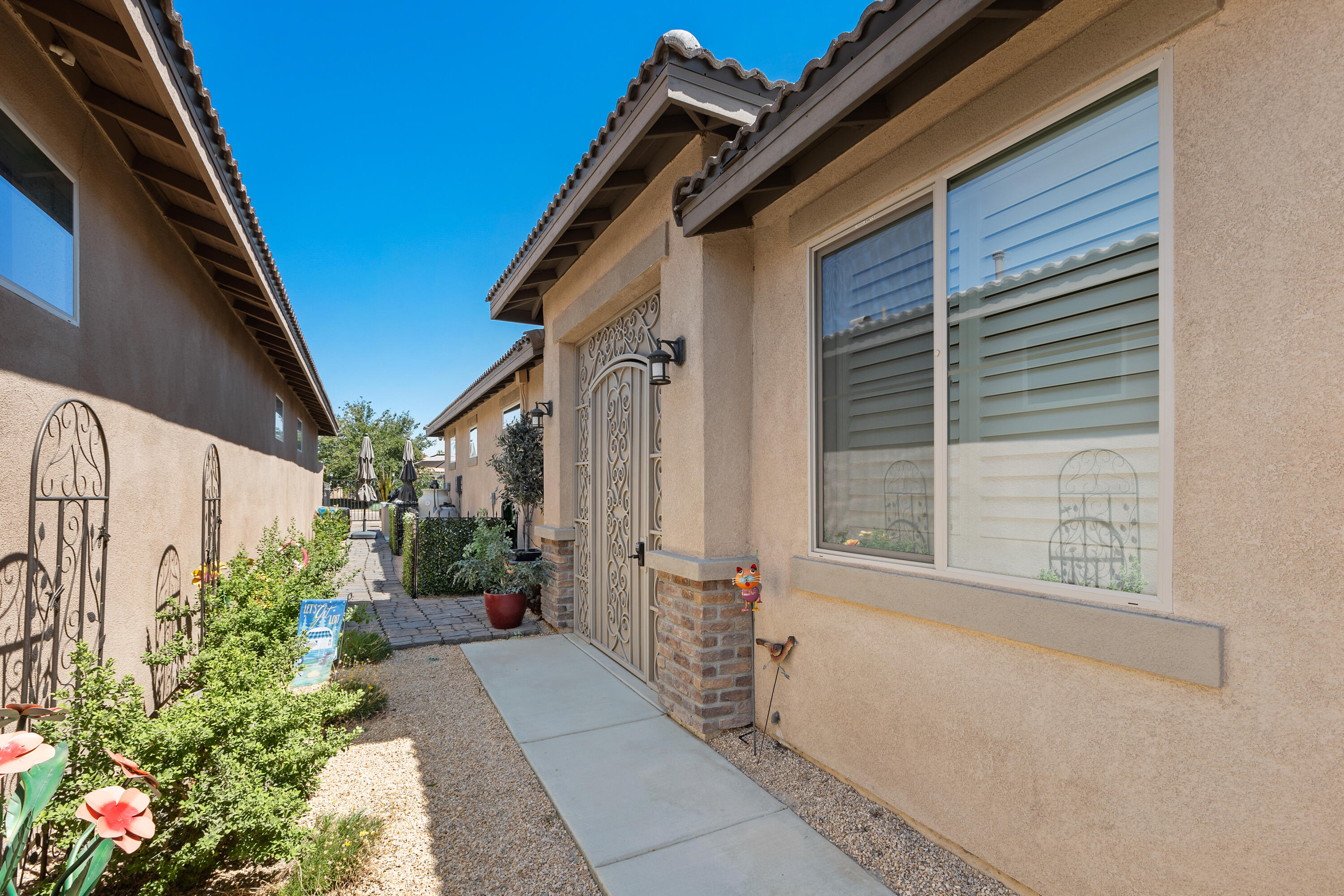 82700 Burnette Drive Indio, CA 92201 - Photo 36 of 38 a view of a house with a backyard