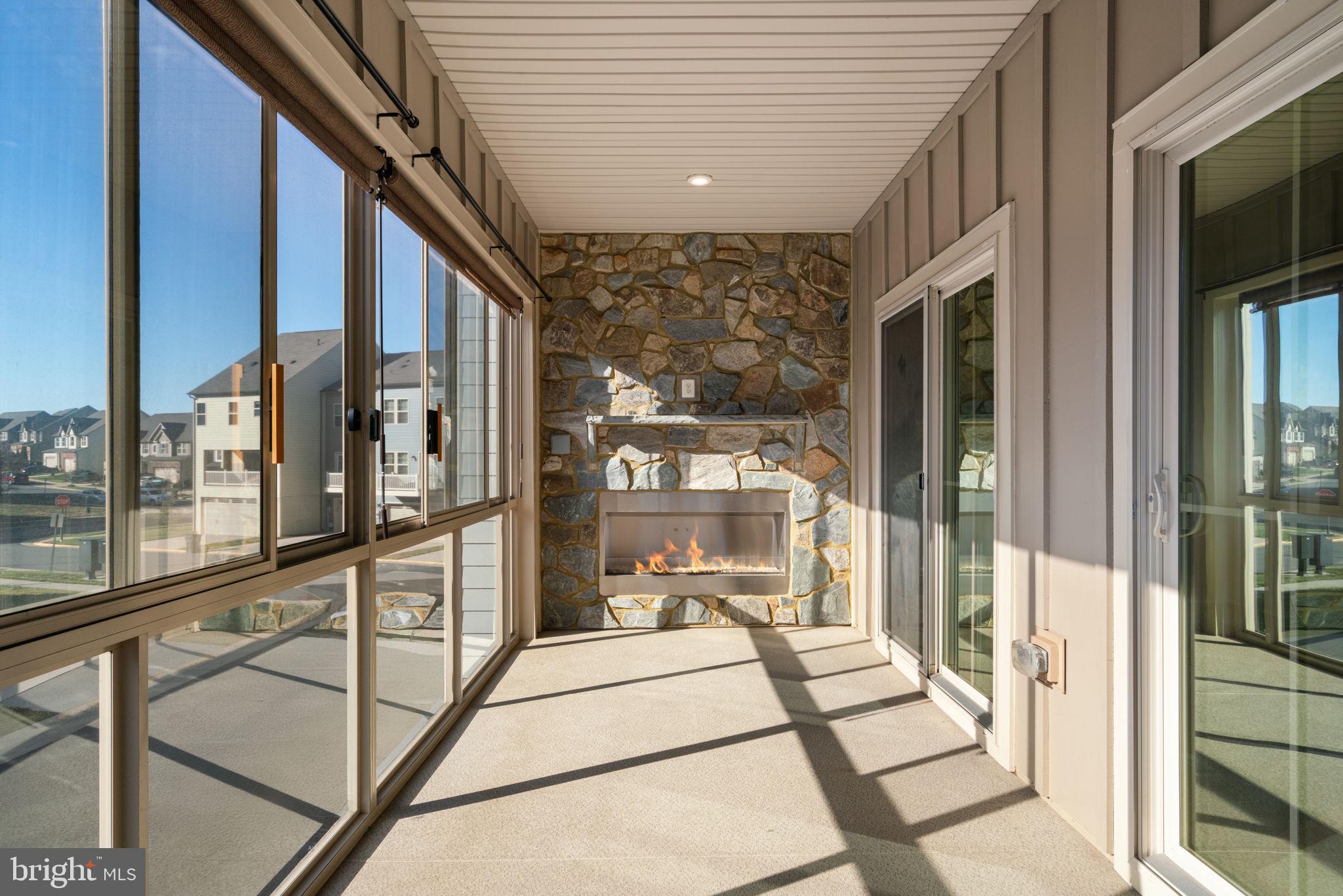 18037 Red Mulberry Road Dumfries, VA 22026 - Photo 21 of 74 Sunroom with fireplace