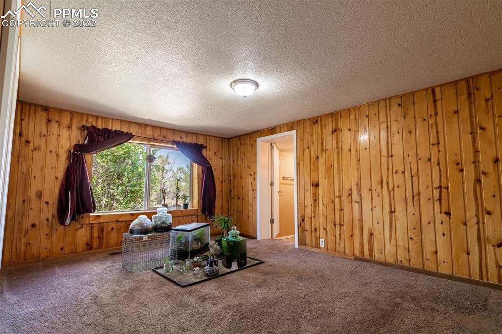 918 B Street Penrose, CO 81240 - Photo 11 of 23 a living room with furniture and a large window