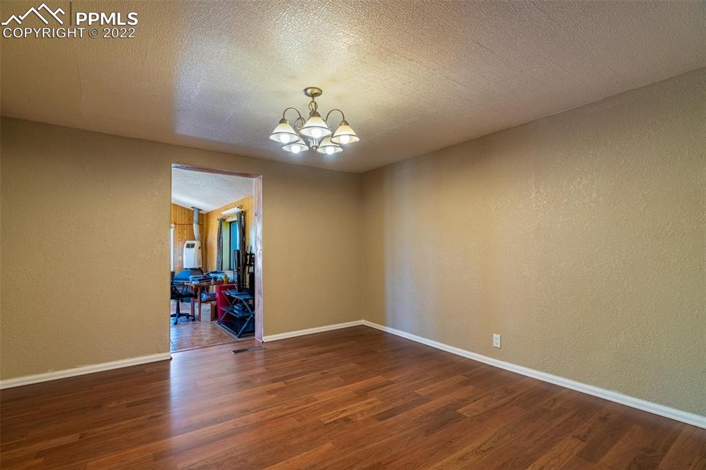 918 B Street Penrose, CO 81240 - Photo 14 of 23 a view of a livingroom with a wooden furniture