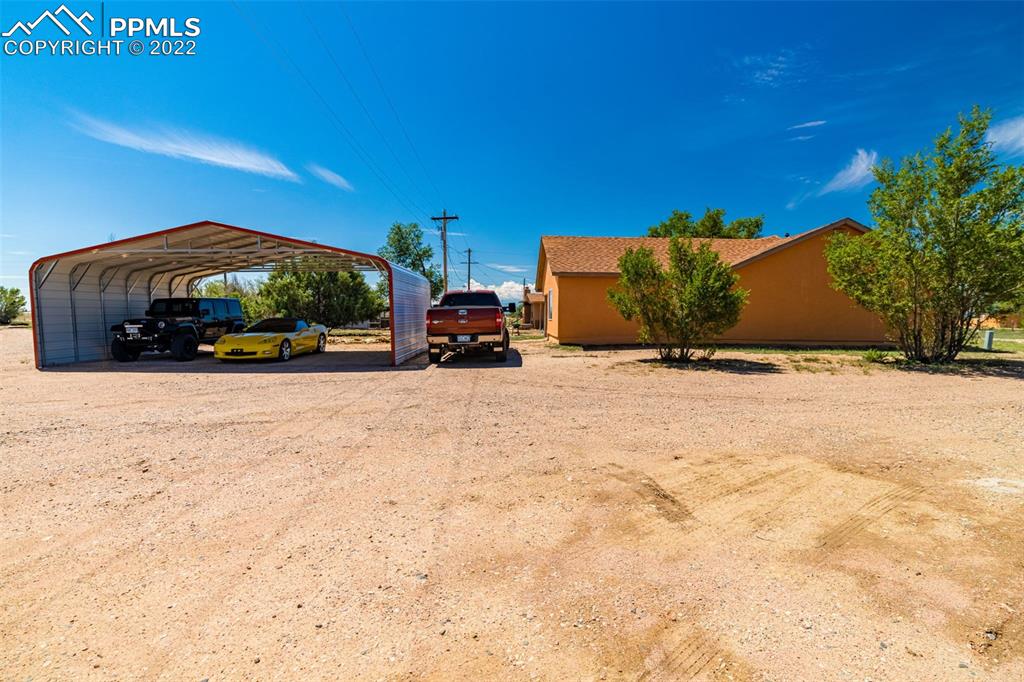918 B Street Penrose, CO 81240 - Photo 2 of 23 a view of a road with a building in the background