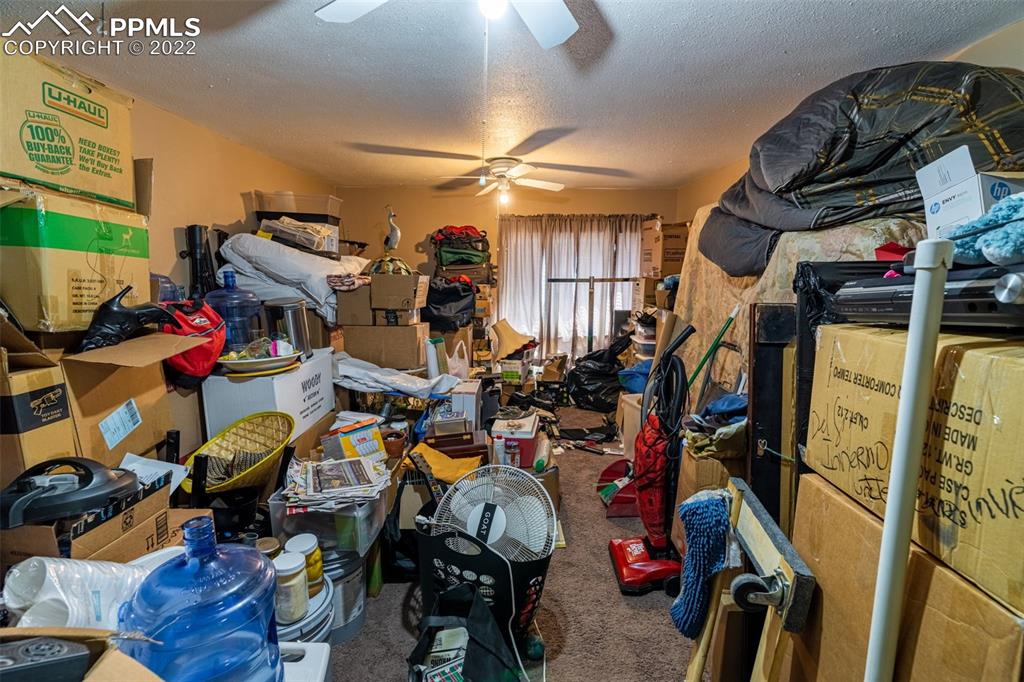918 B Street Penrose, CO 81240 - Photo 21 of 23 a view of a storage room with washer and dryer