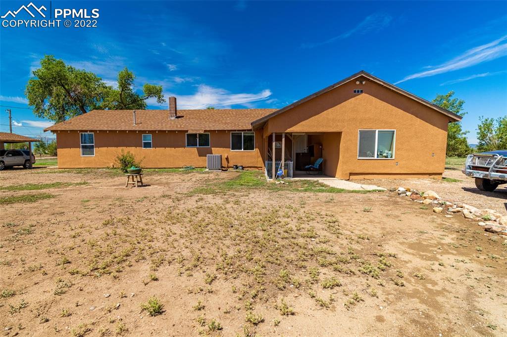 918 B Street Penrose, CO 81240 - Photo 4 of 23 a view of a house with a yard