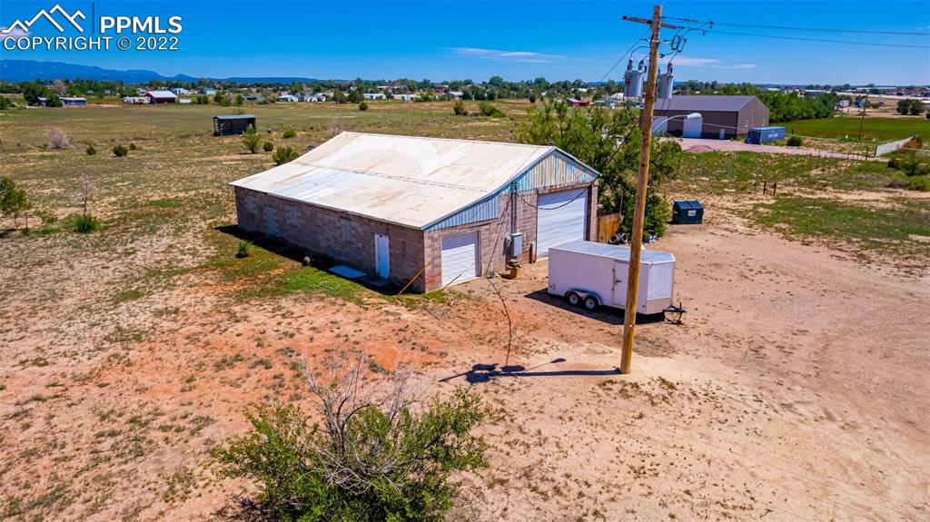 918 B Street Penrose, CO 81240 - Photo 5 of 23 a car parked on the side of the river