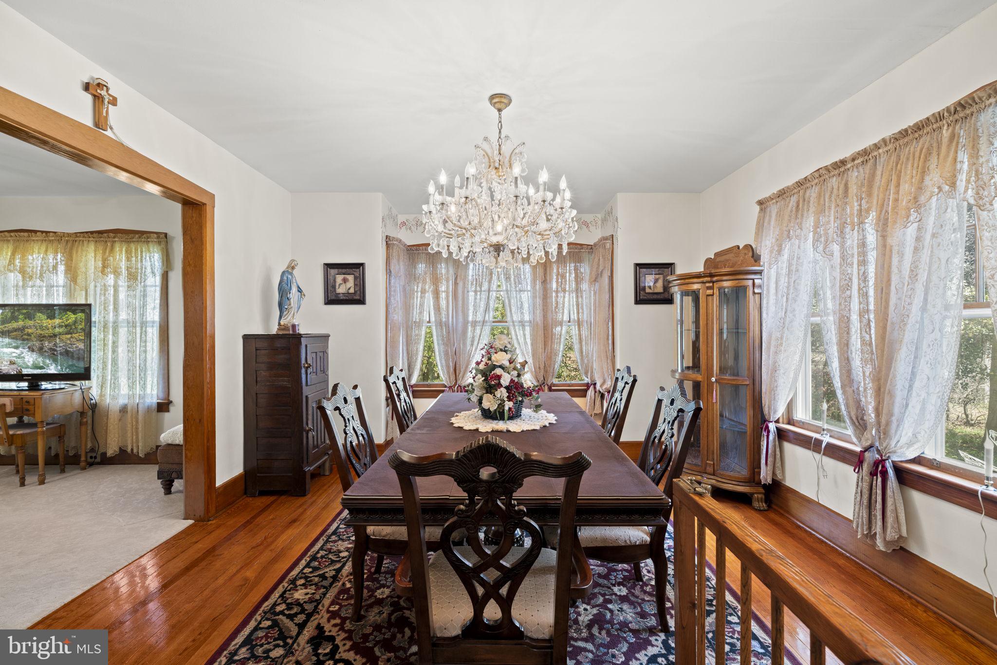 186 South Rte 73 Hammonton, NJ 08037 - Photo 11 of 38 a view of a dining room with furniture and a chandelier