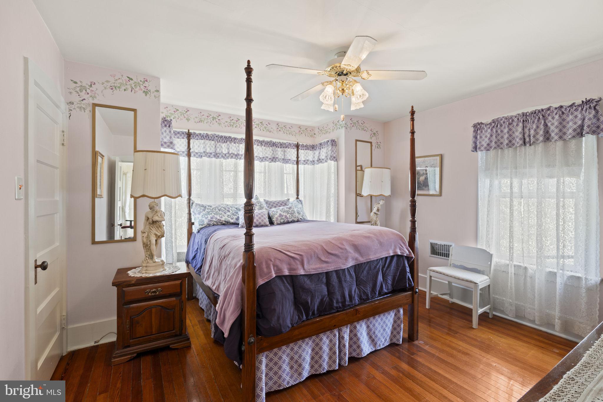 186 South Rte 73 Hammonton, NJ 08037 - Photo 20 of 38 a bedroom with a bed and a chandelier