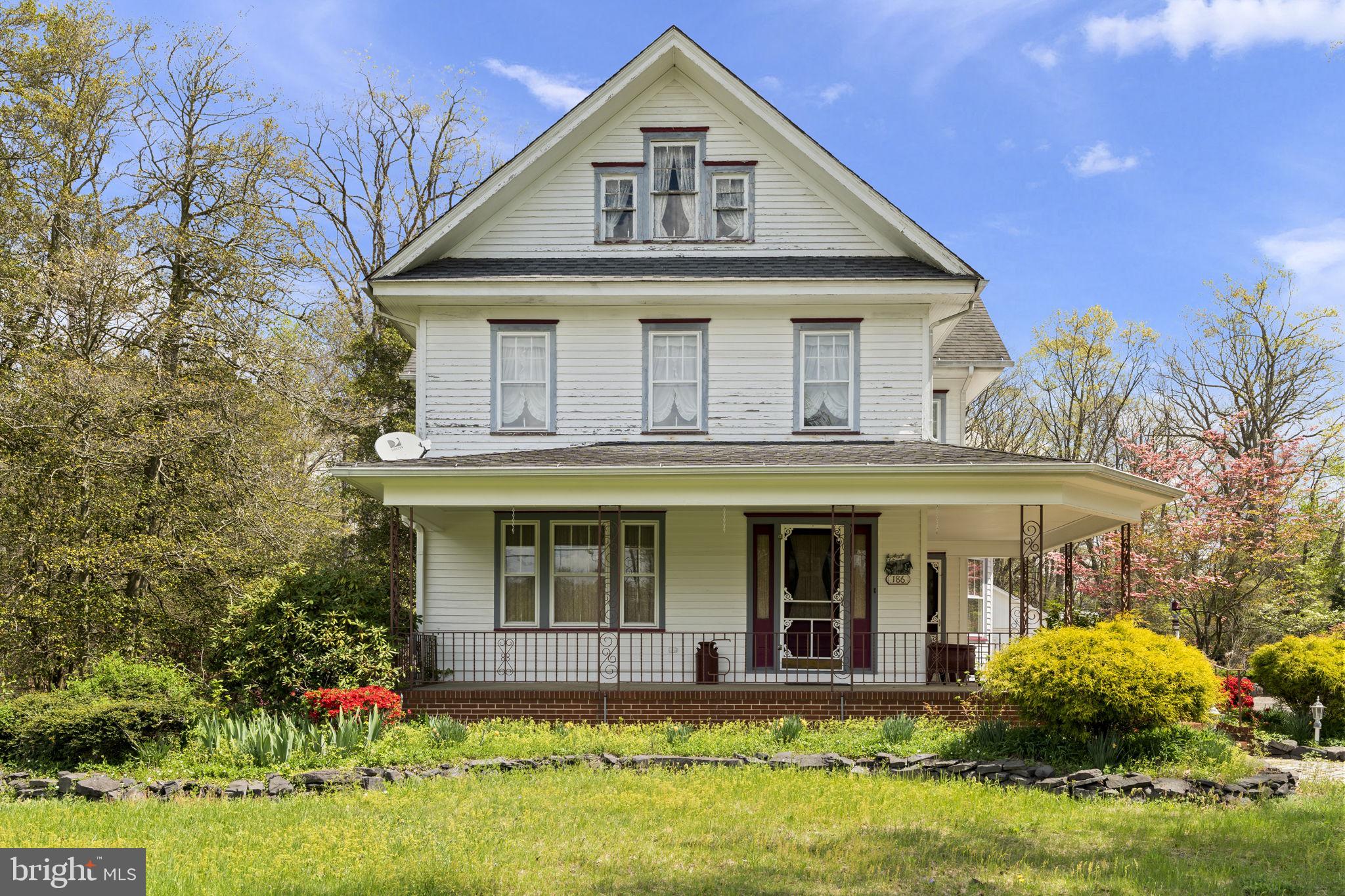 186 South Rte 73 Hammonton, NJ 08037 - Photo 2 of 38 front view of a house with a yard