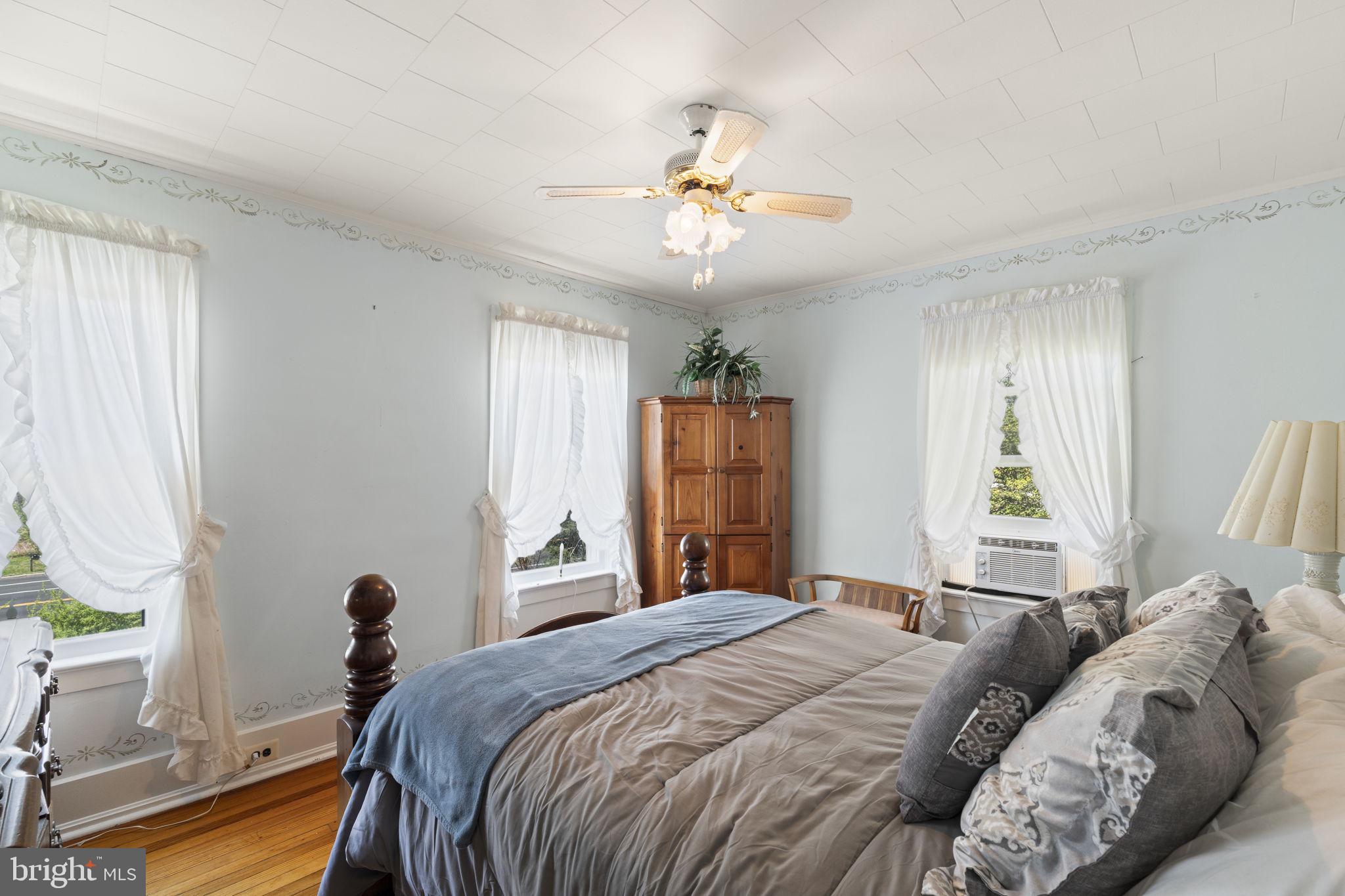 186 South Rte 73 Hammonton, NJ 08037 - Photo 21 of 38 a bedroom with a bed table and a window