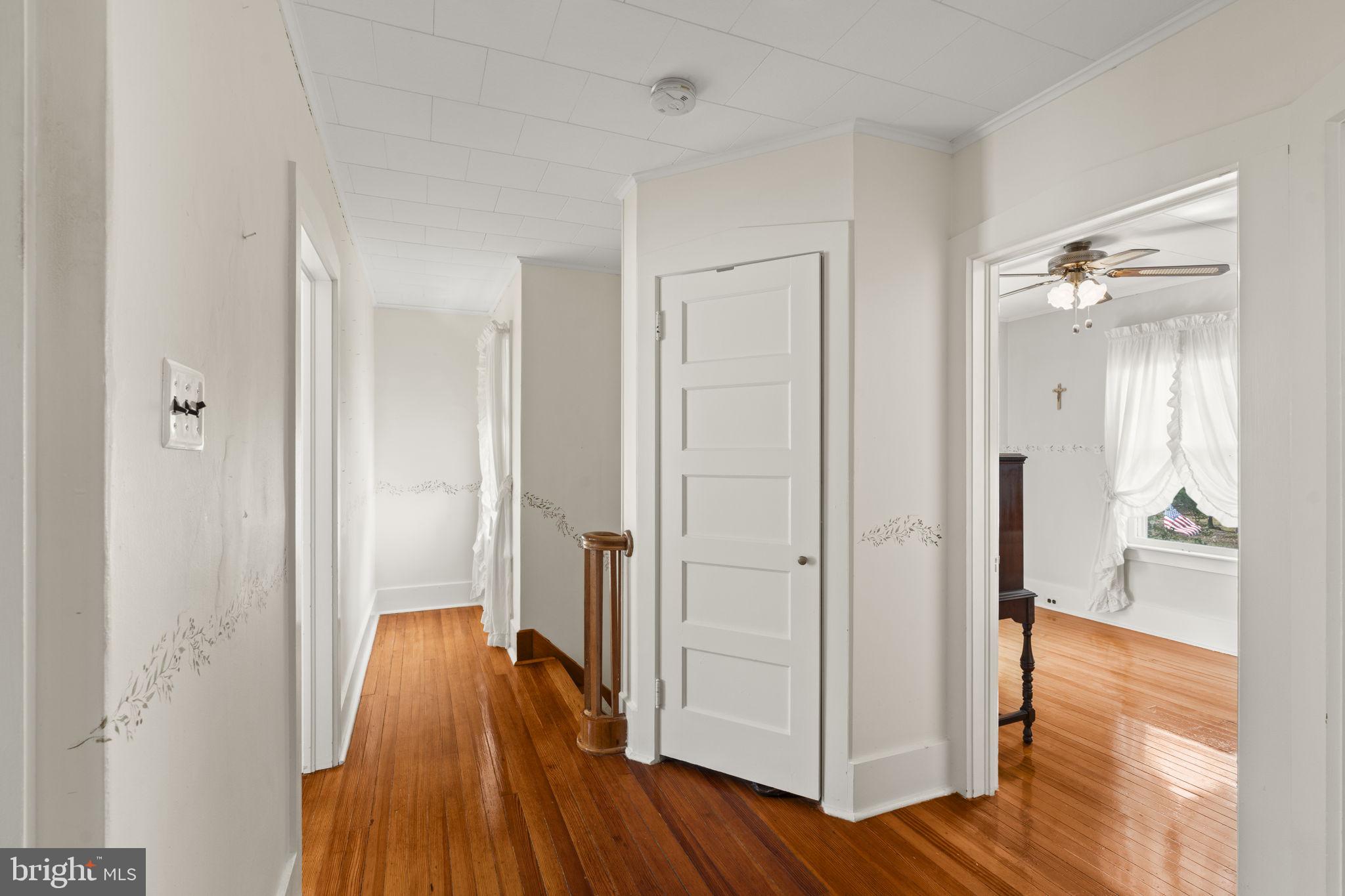 186 South Rte 73 Hammonton, NJ 08037 - Photo 25 of 38 a view of a hallway with wooden floor