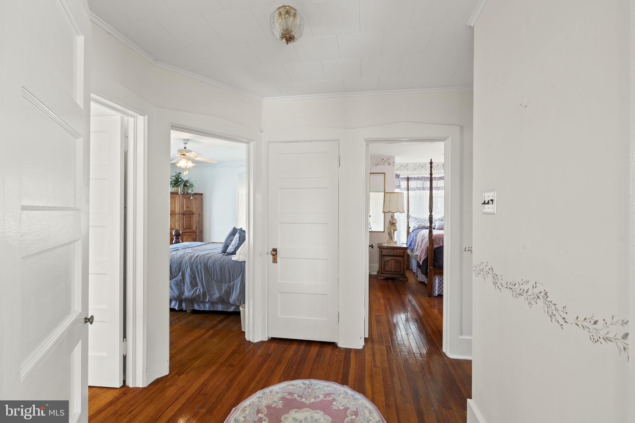 186 South Rte 73 Hammonton, NJ 08037 - Photo 26 of 38 a bedroom with furniture and a wooden floor
