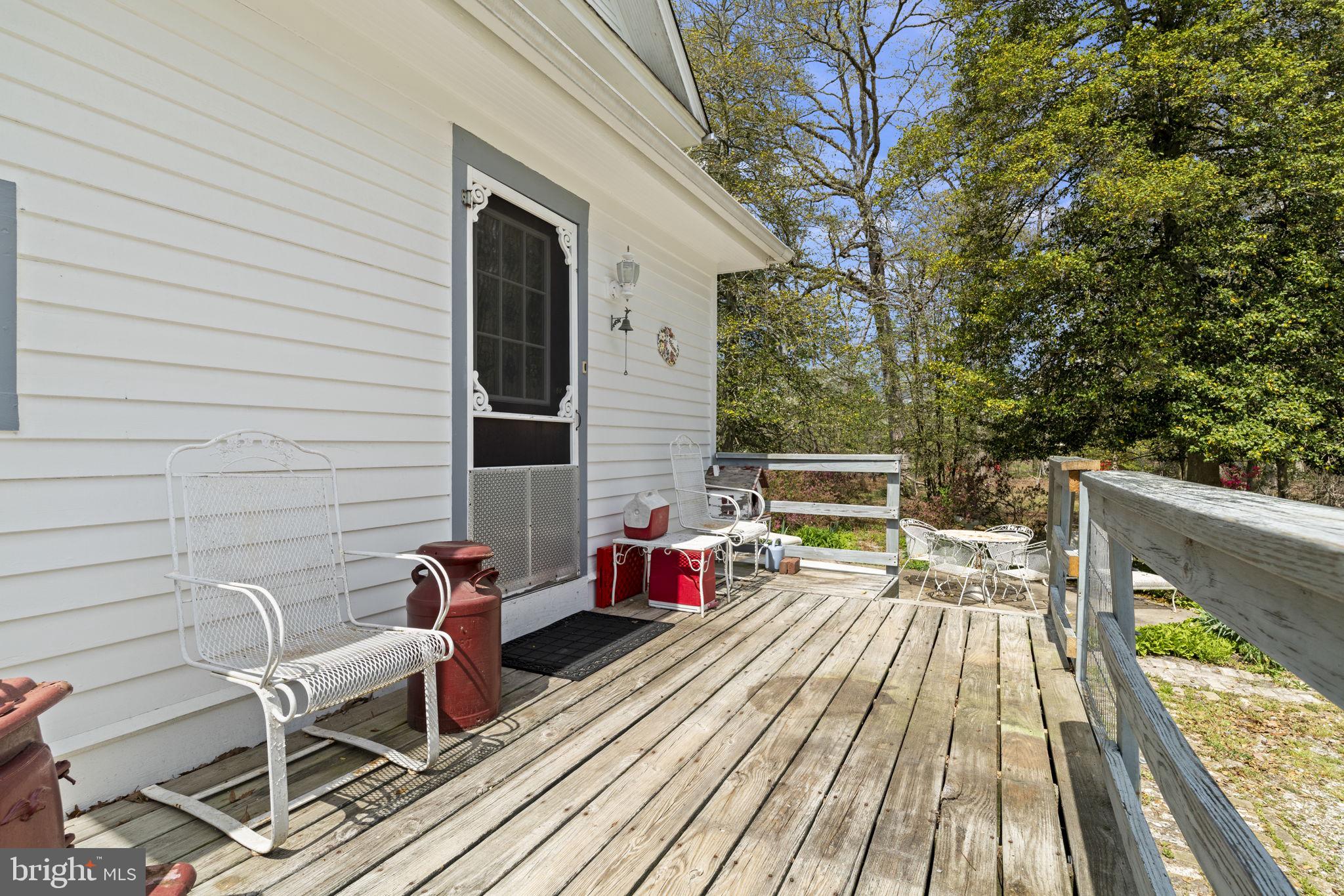 186 South Rte 73 Hammonton, NJ 08037 - Photo 30 of 38 a view of deck with chairs and potted plants