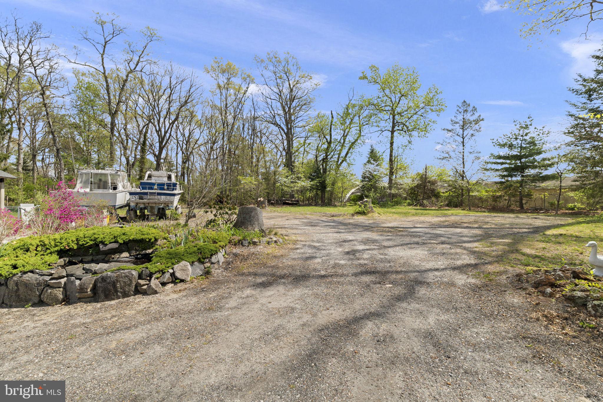 186 South Rte 73 Hammonton, NJ 08037 - Photo 33 of 38 a view of a yard with palm trees
