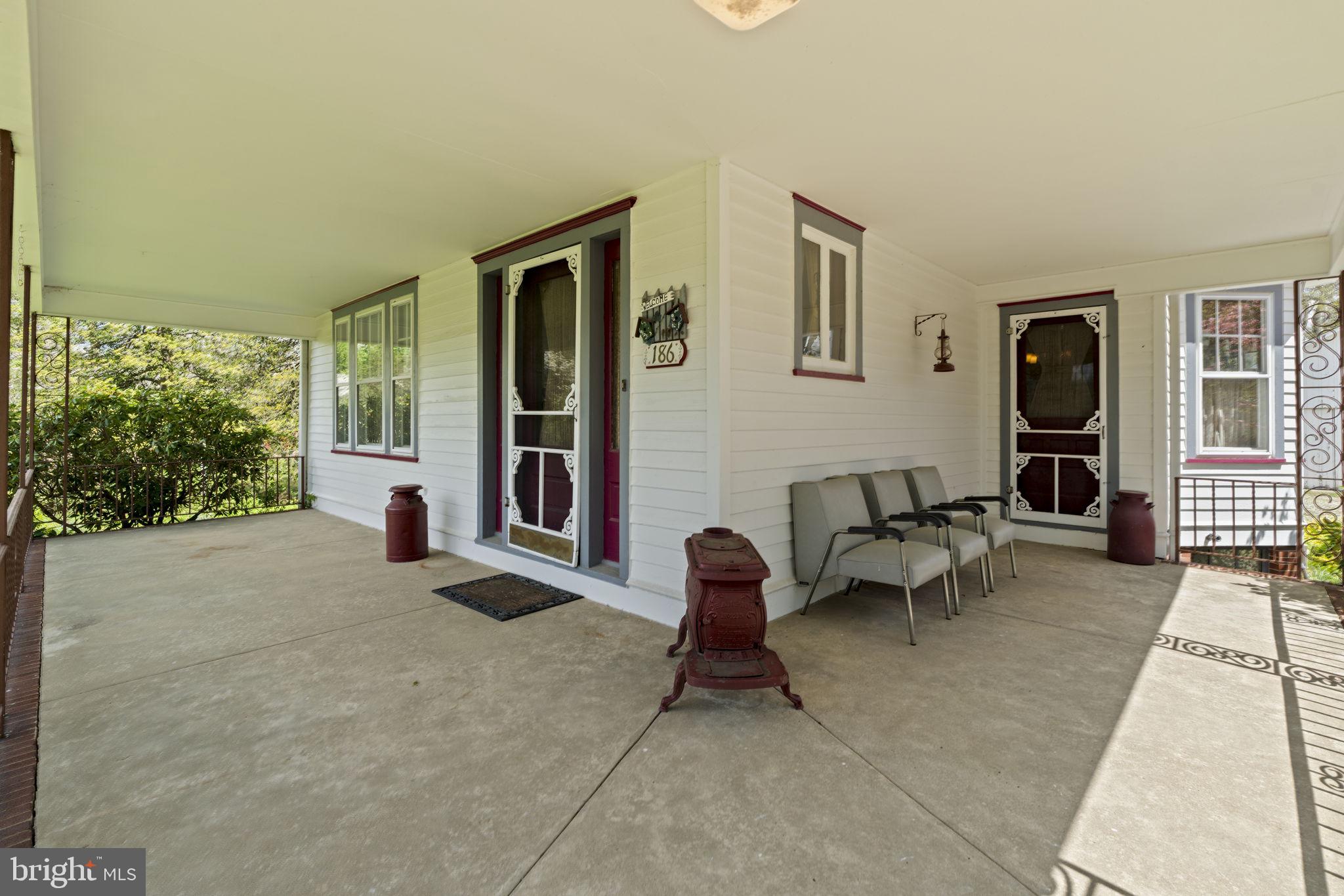 186 South Rte 73 Hammonton, NJ 08037 - Photo 6 of 38 a living room with furniture and a window