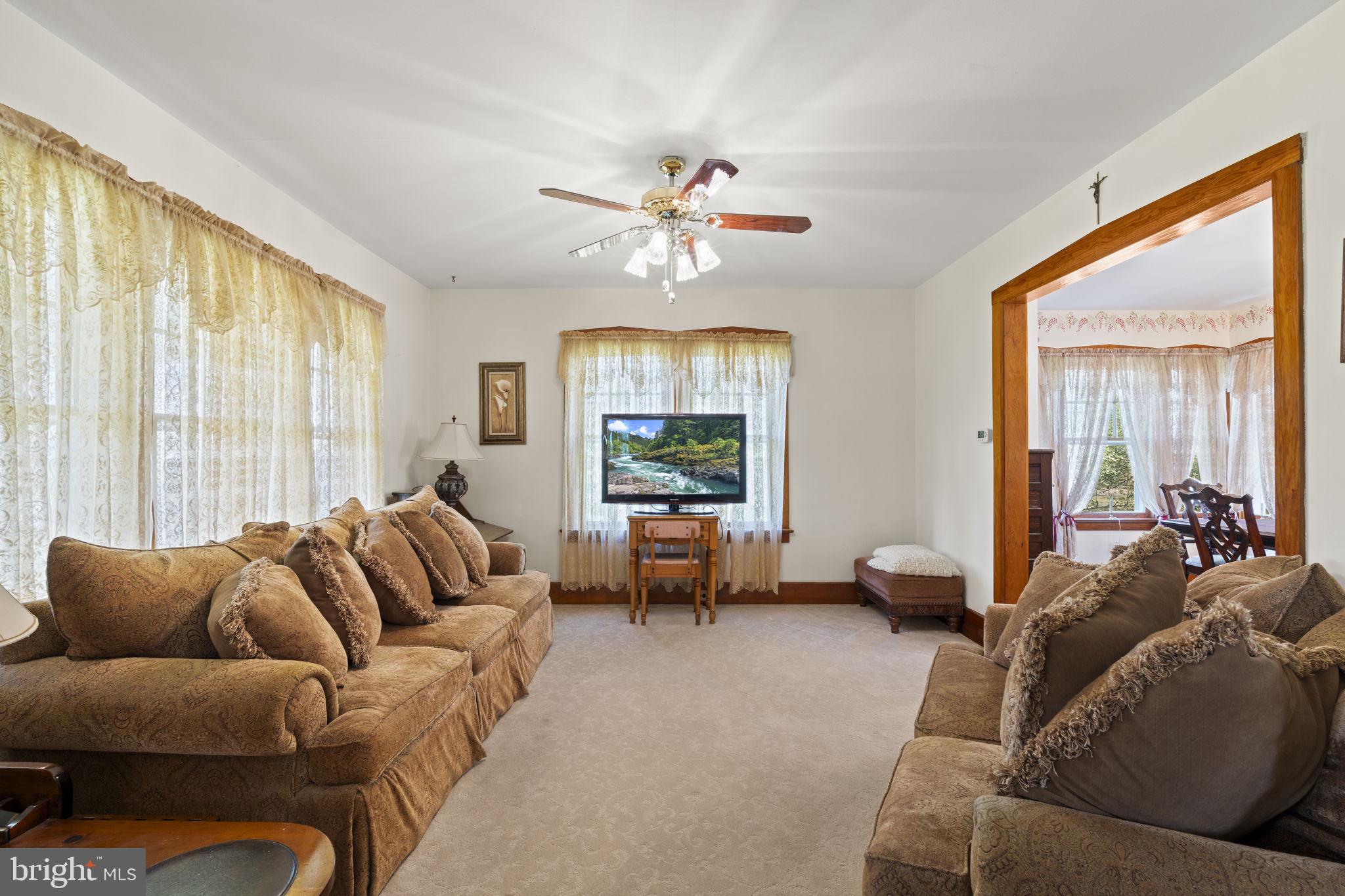 186 South Rte 73 Hammonton, NJ 08037 - Photo 8 of 38 a living room with furniture and a large window