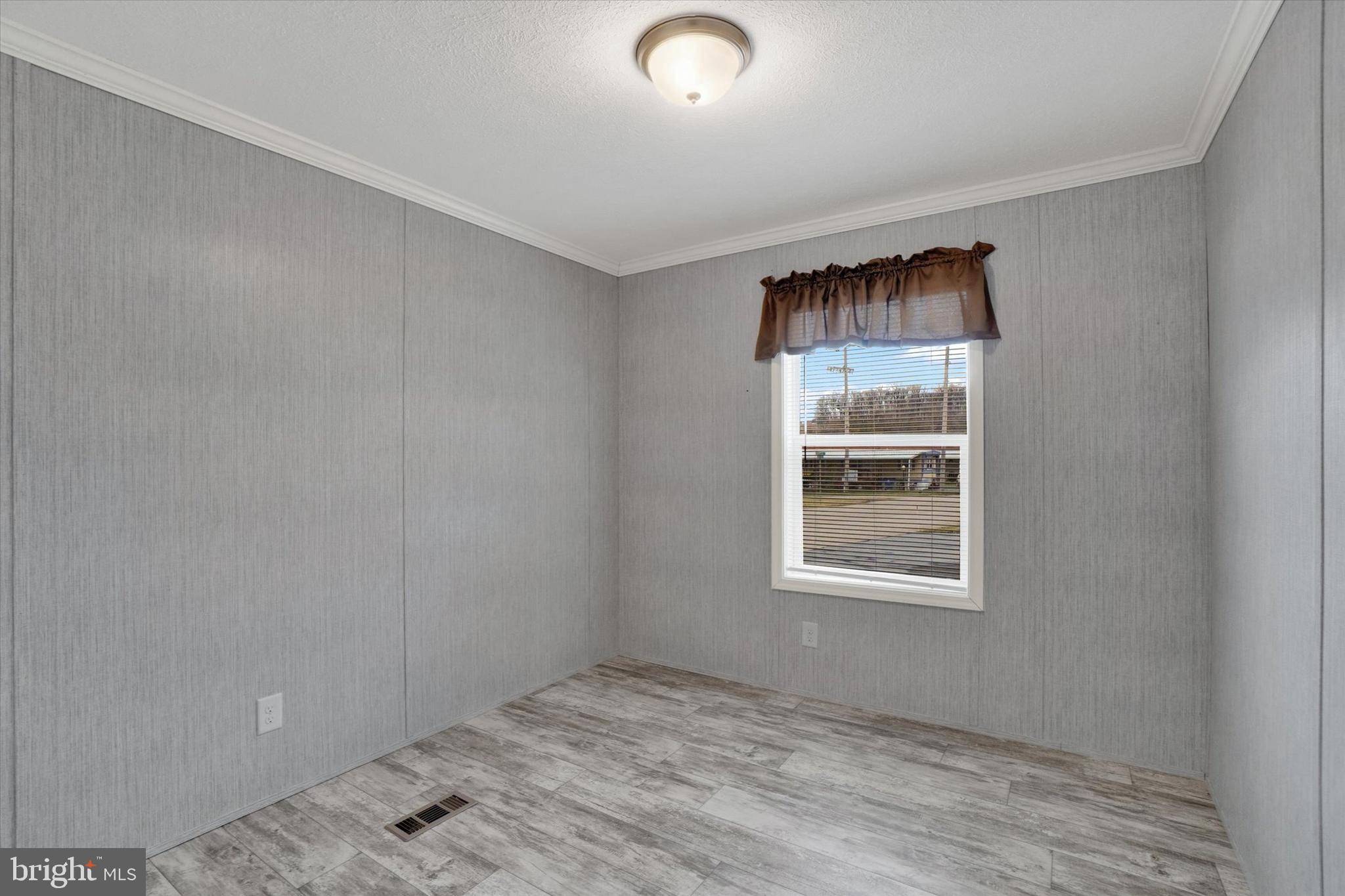 208 Country Ridge Drive York, PA 17408 - Photo 14 of 26 a view of an empty room with a window