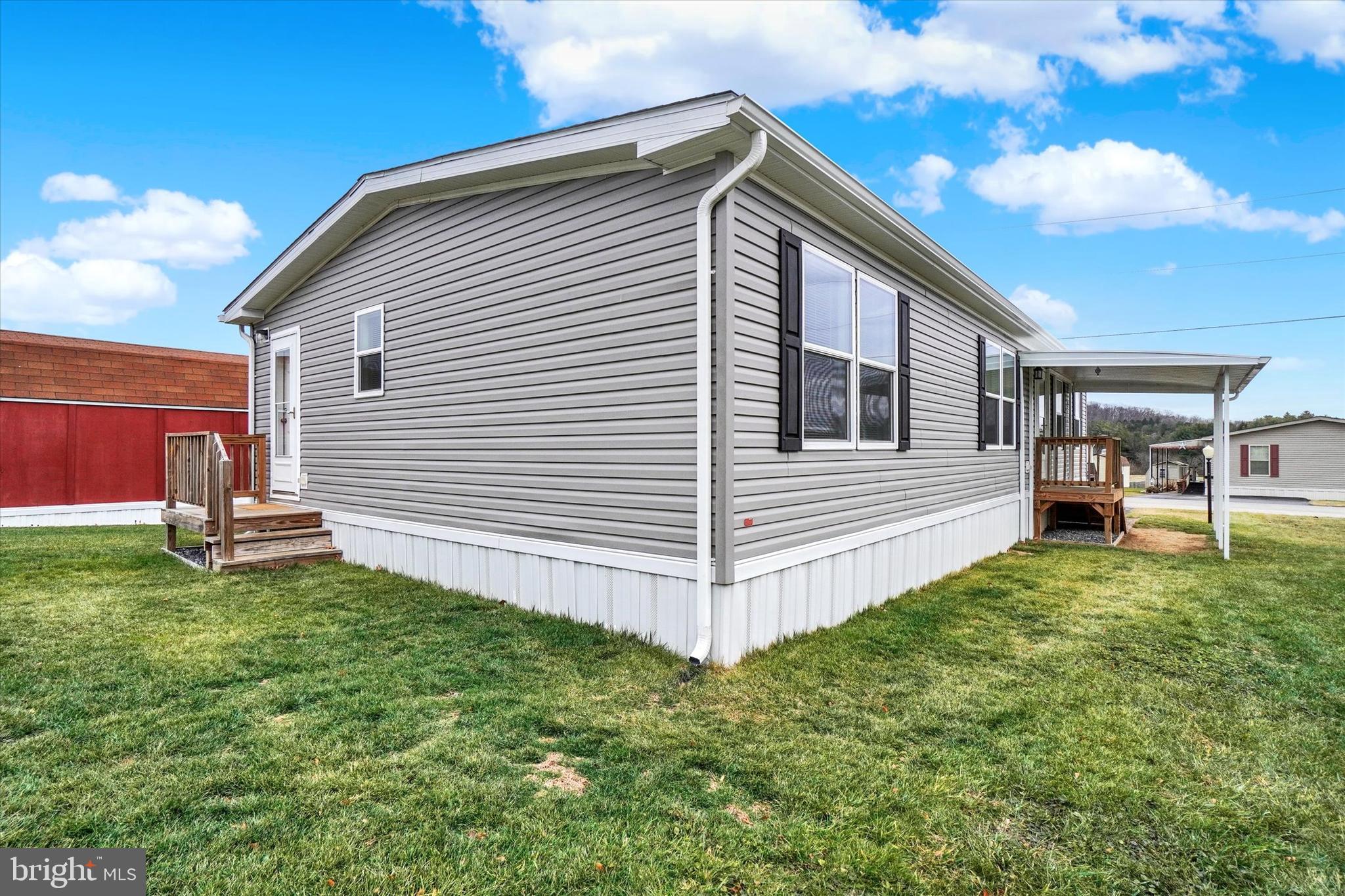 208 Country Ridge Drive York, PA 17408 - Photo 24 of 26 a view of a house with a backyard
