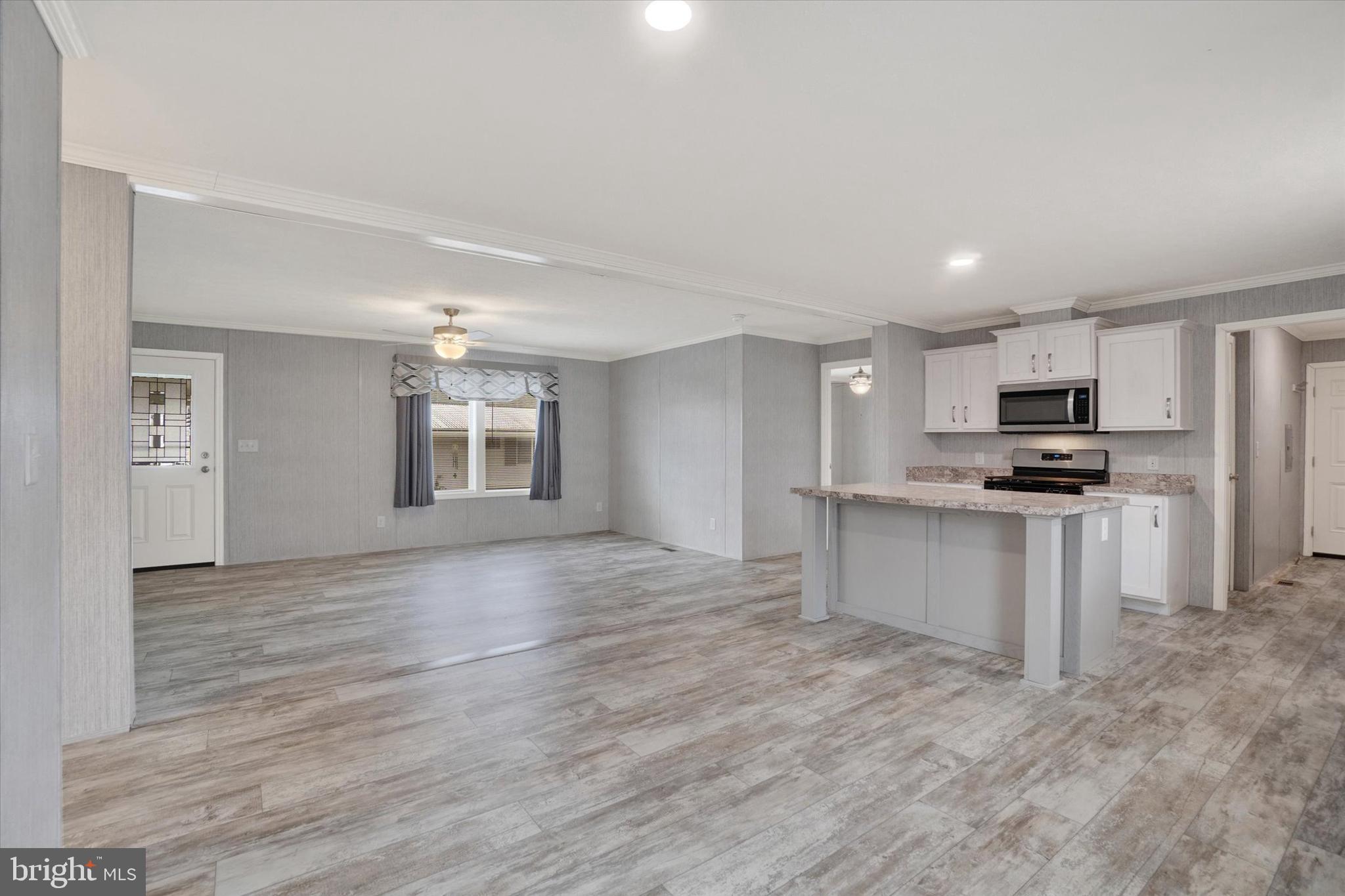 208 Country Ridge Drive York, PA 17408 - Photo 5 of 26 a view of kitchen with granite countertop cabinets and refrigerator