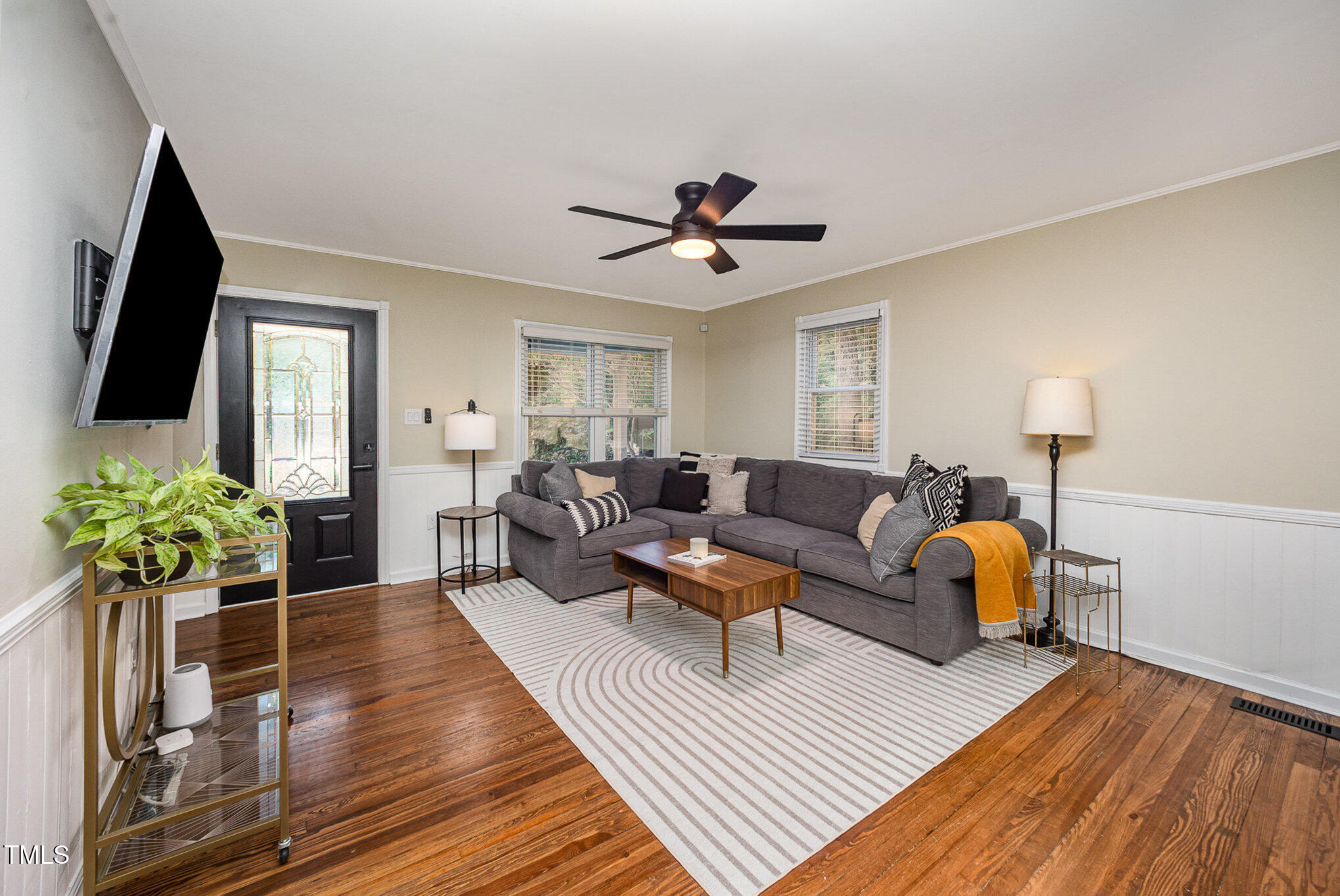 4777 Helena Moriah Road Rougemont, NC 27572 - Photo 5 of 41 a living room with furniture and a flat screen tv