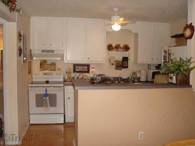 5733 H Bramblegate Road, Unit H Greensboro, NC 27409 - Photo 6 of 9 Other. Another view of kitchen.
