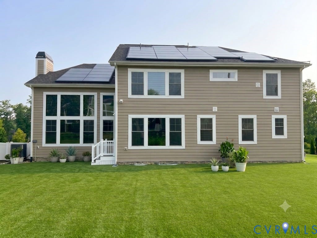 18037 Bay Point Way Moseley, VA 23120 - Photo 5 of 5 Expansive rear exterior featuring a tan siding fac