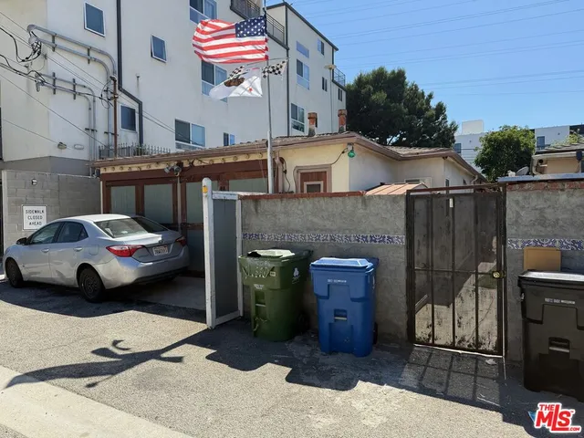 a cars parked in front of a building