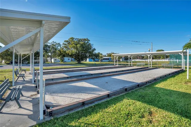 a view of a swimming pool with a patio