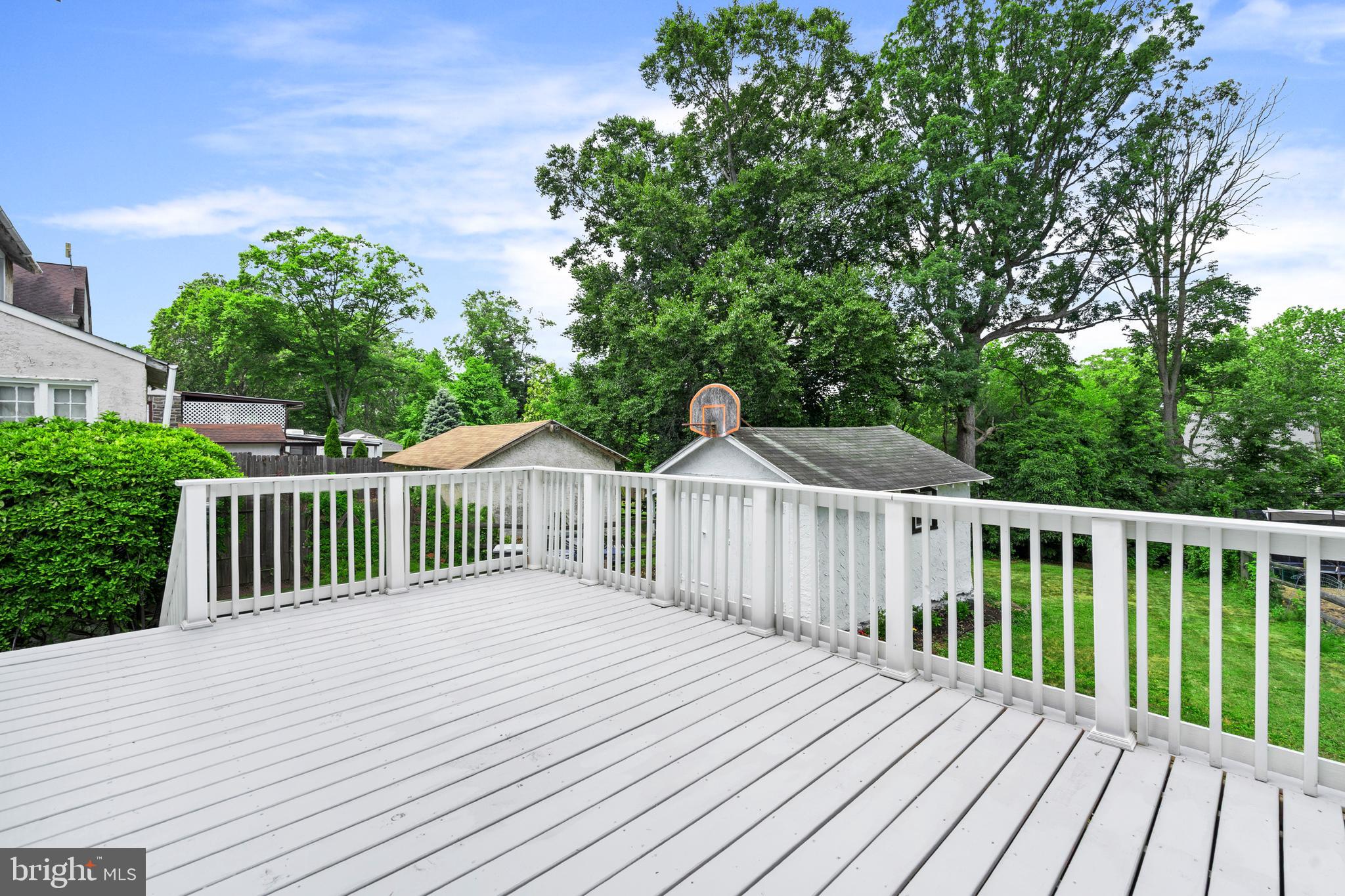 1082 Edge Hill Road Abington, PA 19001 - Photo 15 of 37 a view of a wooden deck and a yard with fence