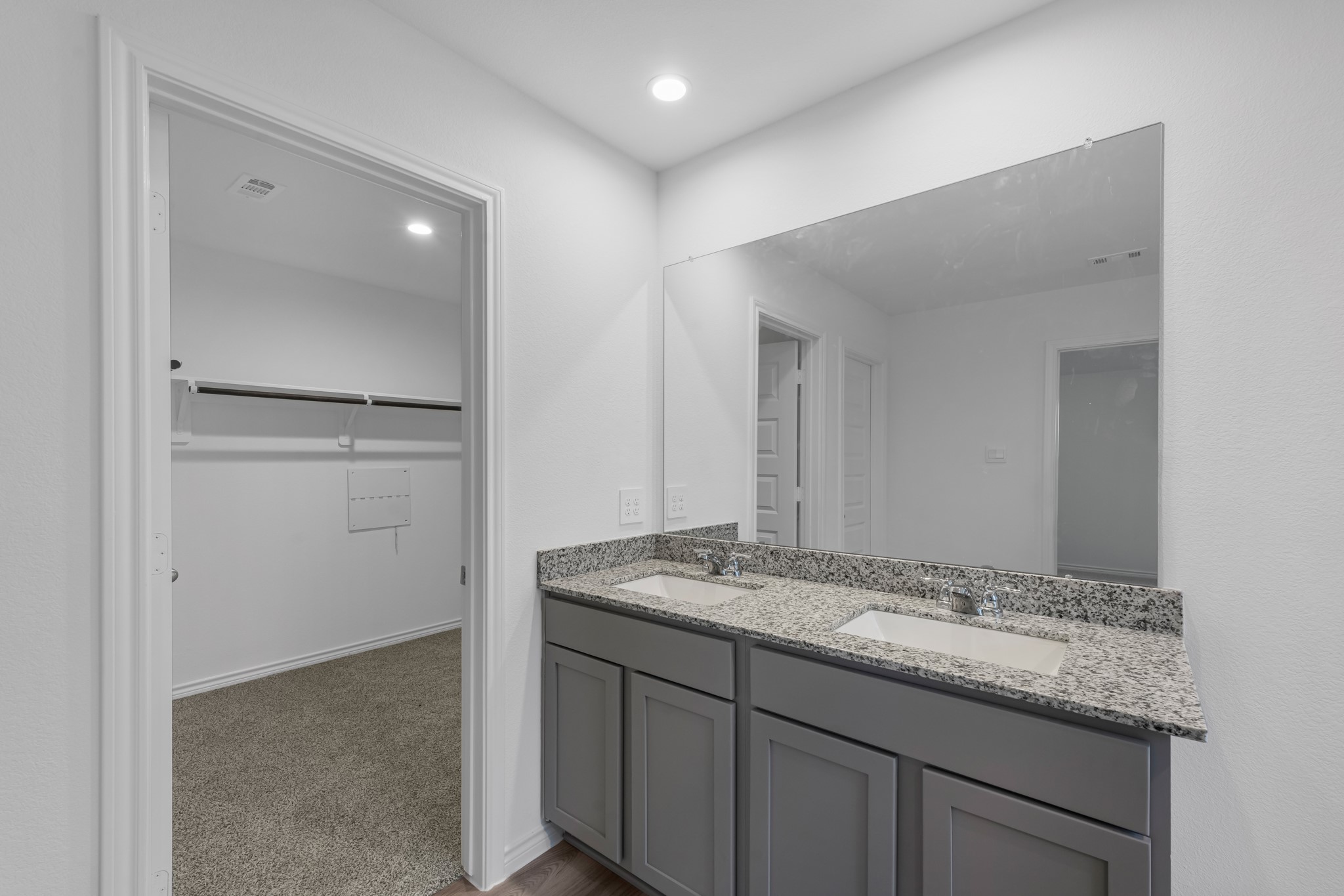 5650 Spoonbill Orange, TX 77632 - Photo 14 of 26 a bathroom with a granite countertop sink and a mirror