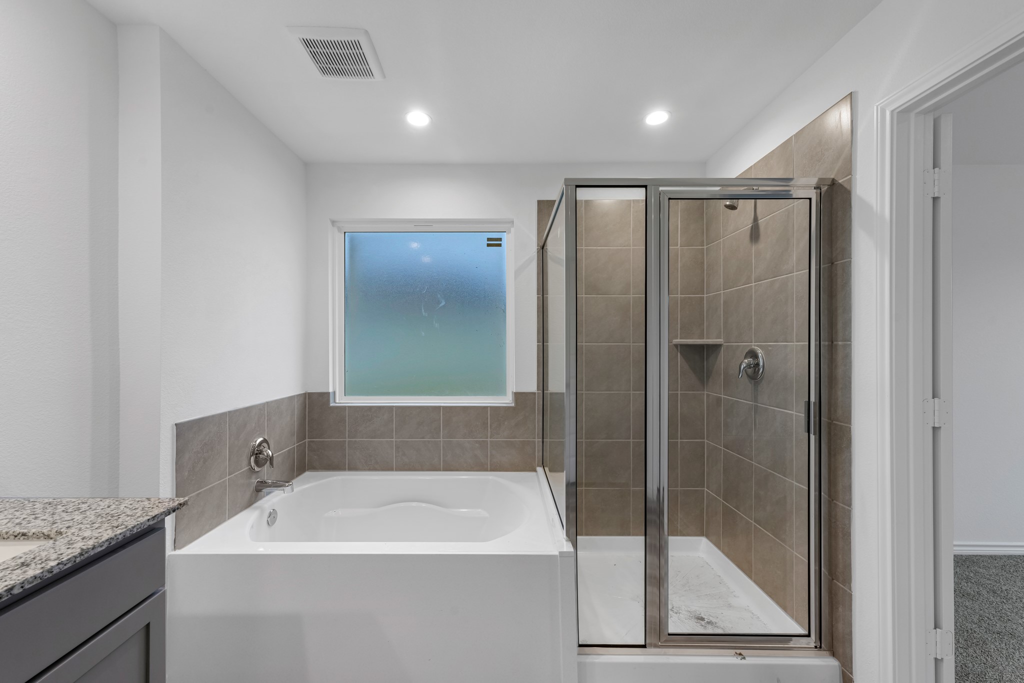 5650 Spoonbill Orange, TX 77632 - Photo 15 of 26 a bathroom with a shower and a sink