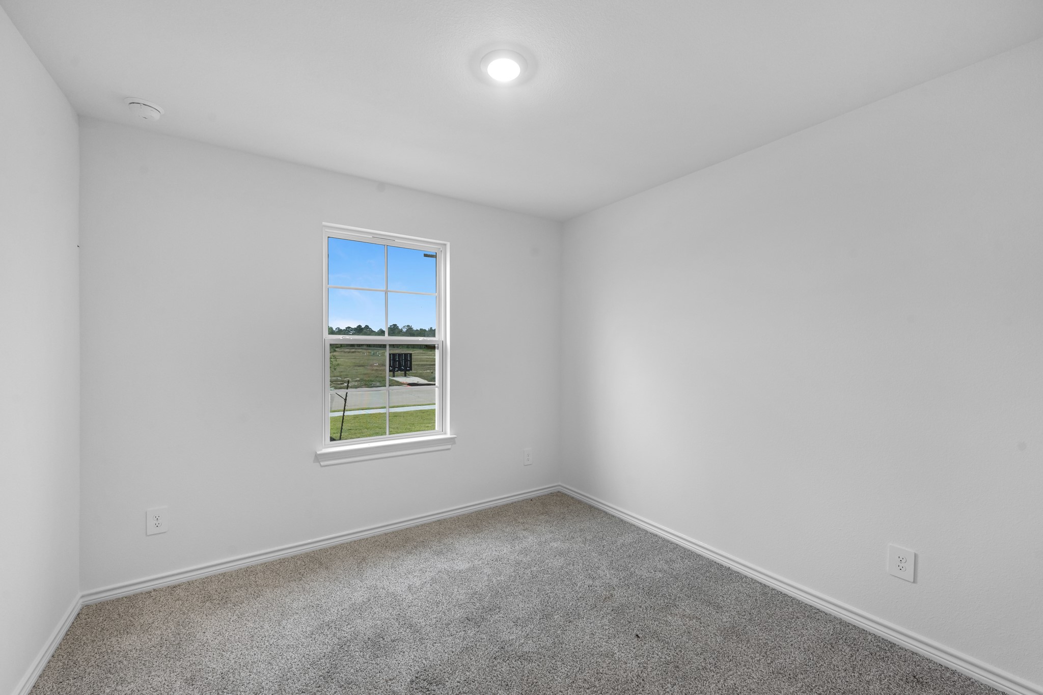 5650 Spoonbill Orange, TX 77632 - Photo 17 of 26 an empty room with a window and a sink
